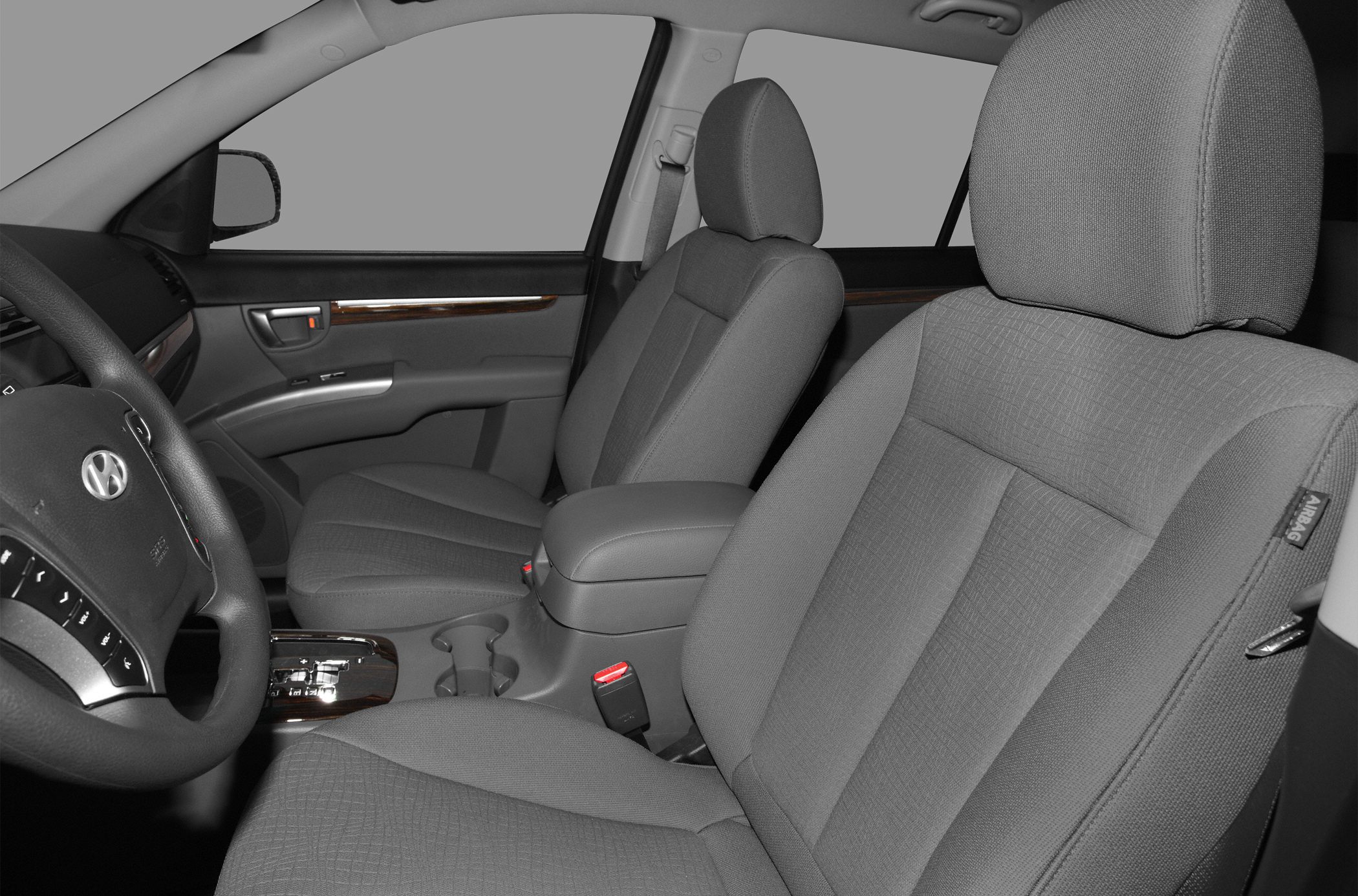 Front seats with gray fabric upholstery and center console