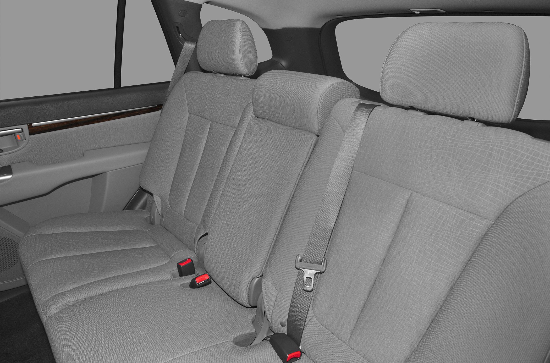 Rear fabric upholstery seats with headrests and seatbelts in SUV interior