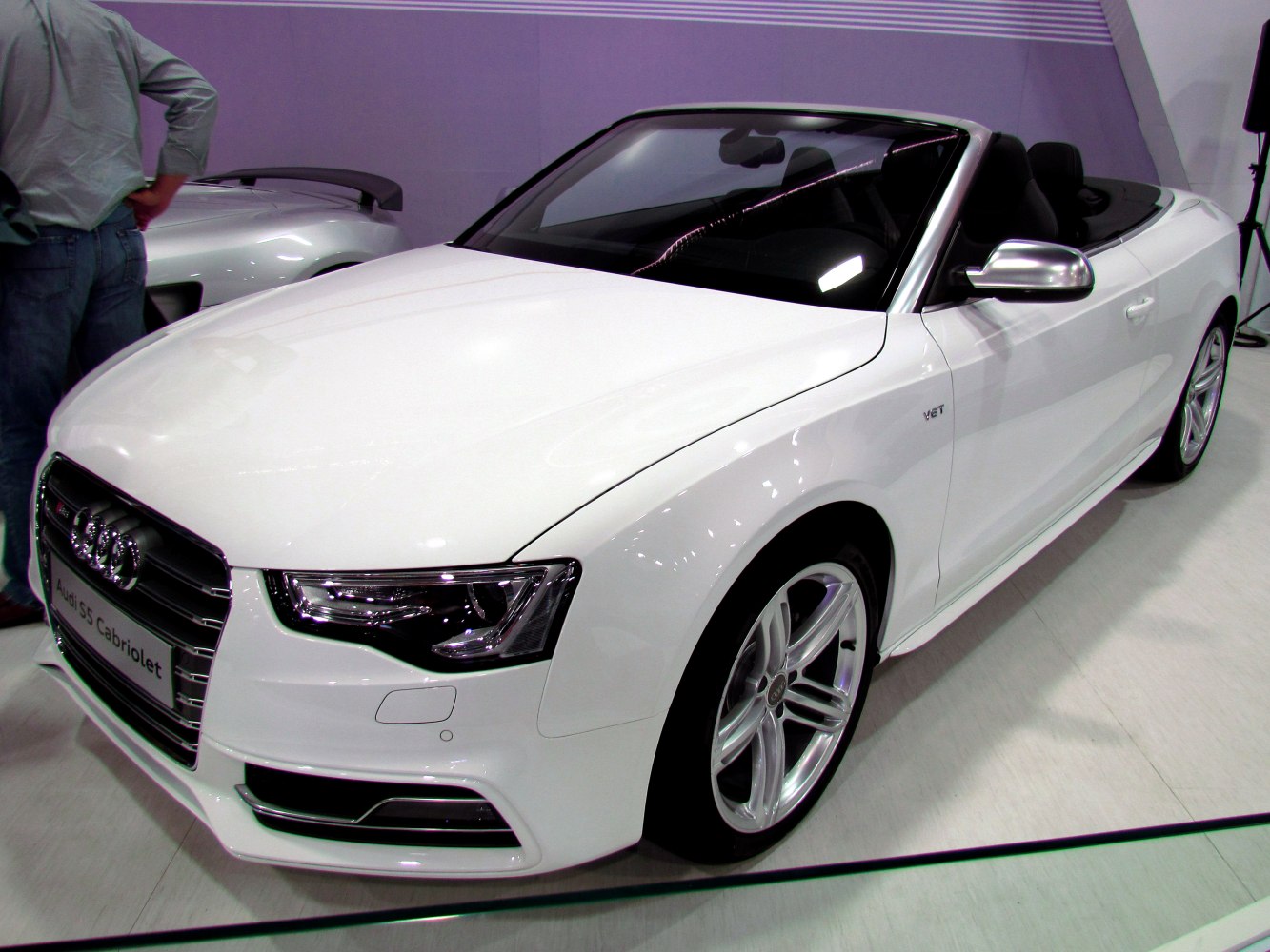 White convertible sports car with LED headlights and alloy wheels