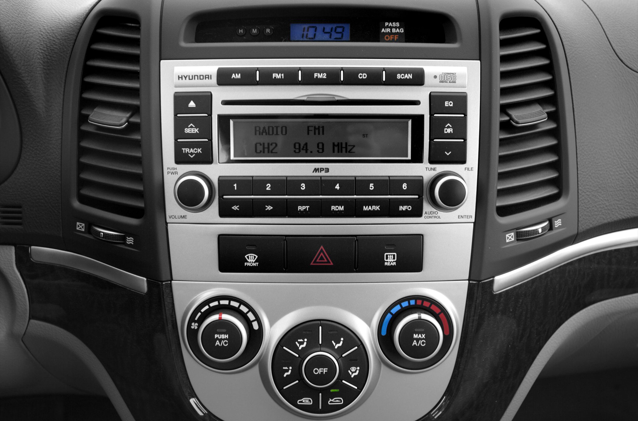 Dashboard center console with audio system and climate controls
