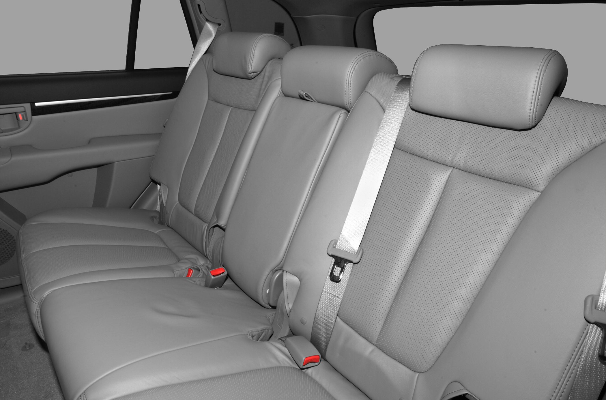 Rear leather seats with headrests and seatbelts