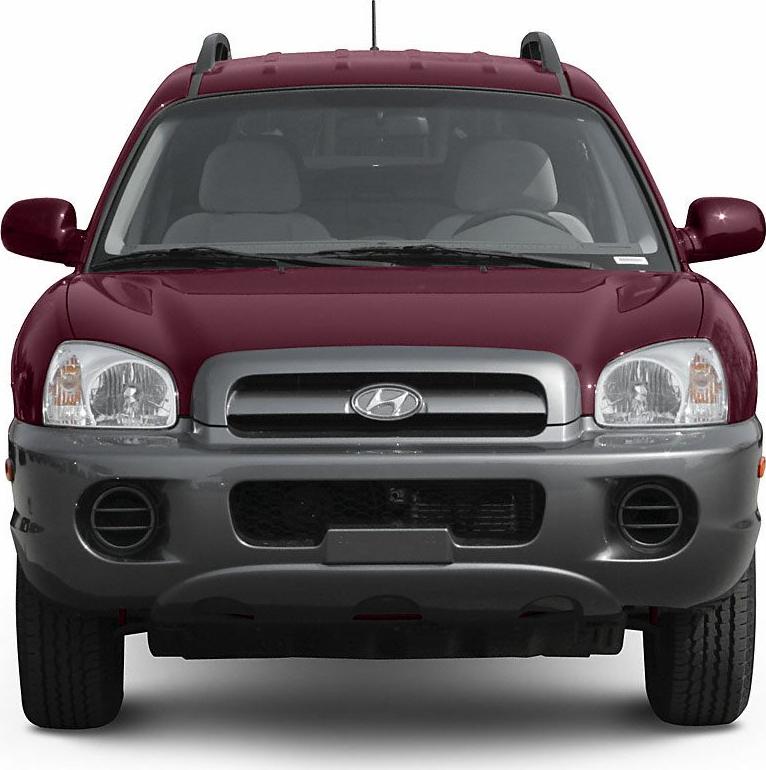Front view of SUV with prominent grille and rounded headlights