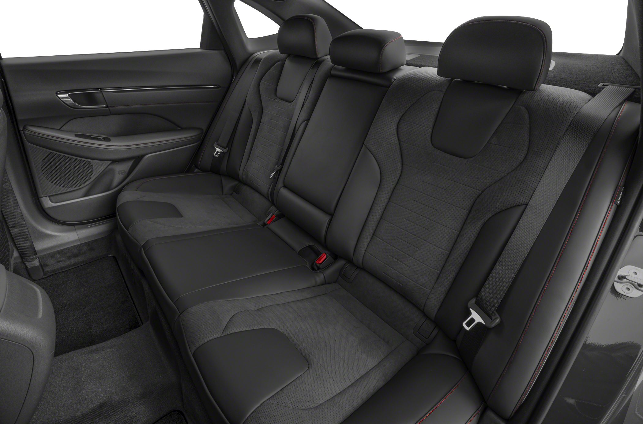 Spacious black rear seats with headrests and seat belts