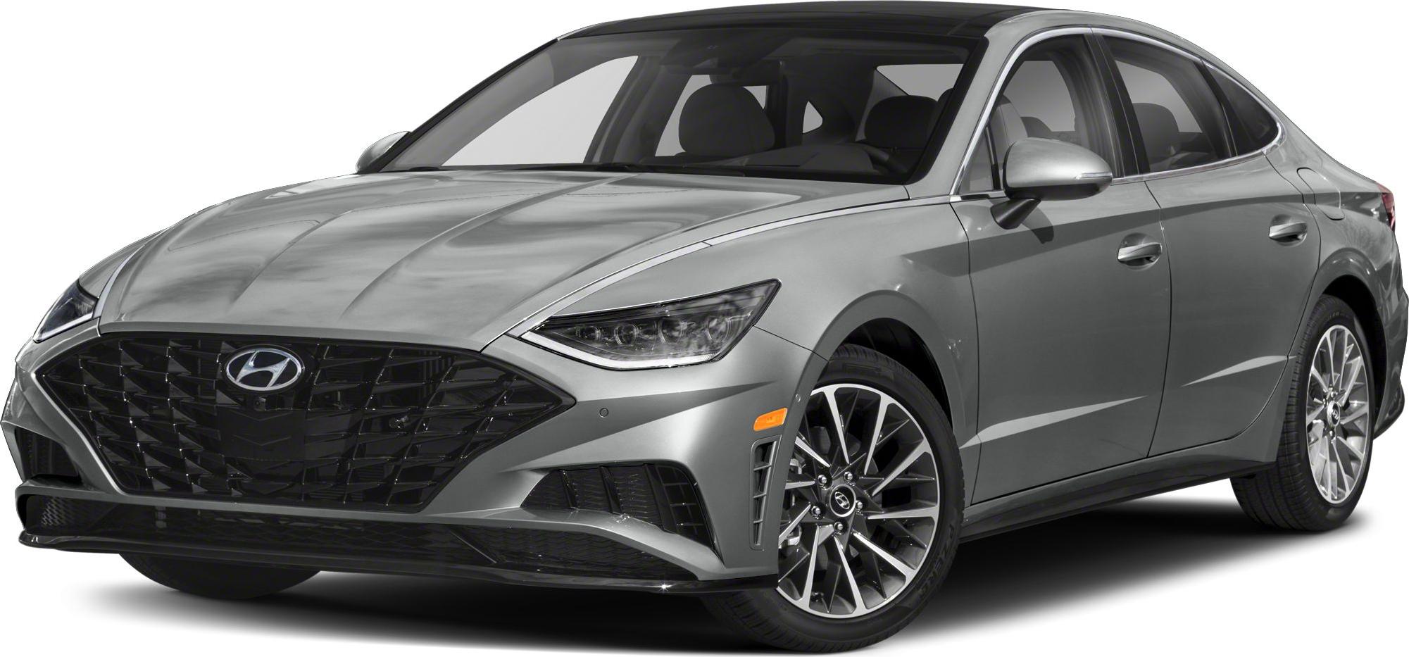 Sharp front grille, angular headlights, and multi-spoke alloy wheels.