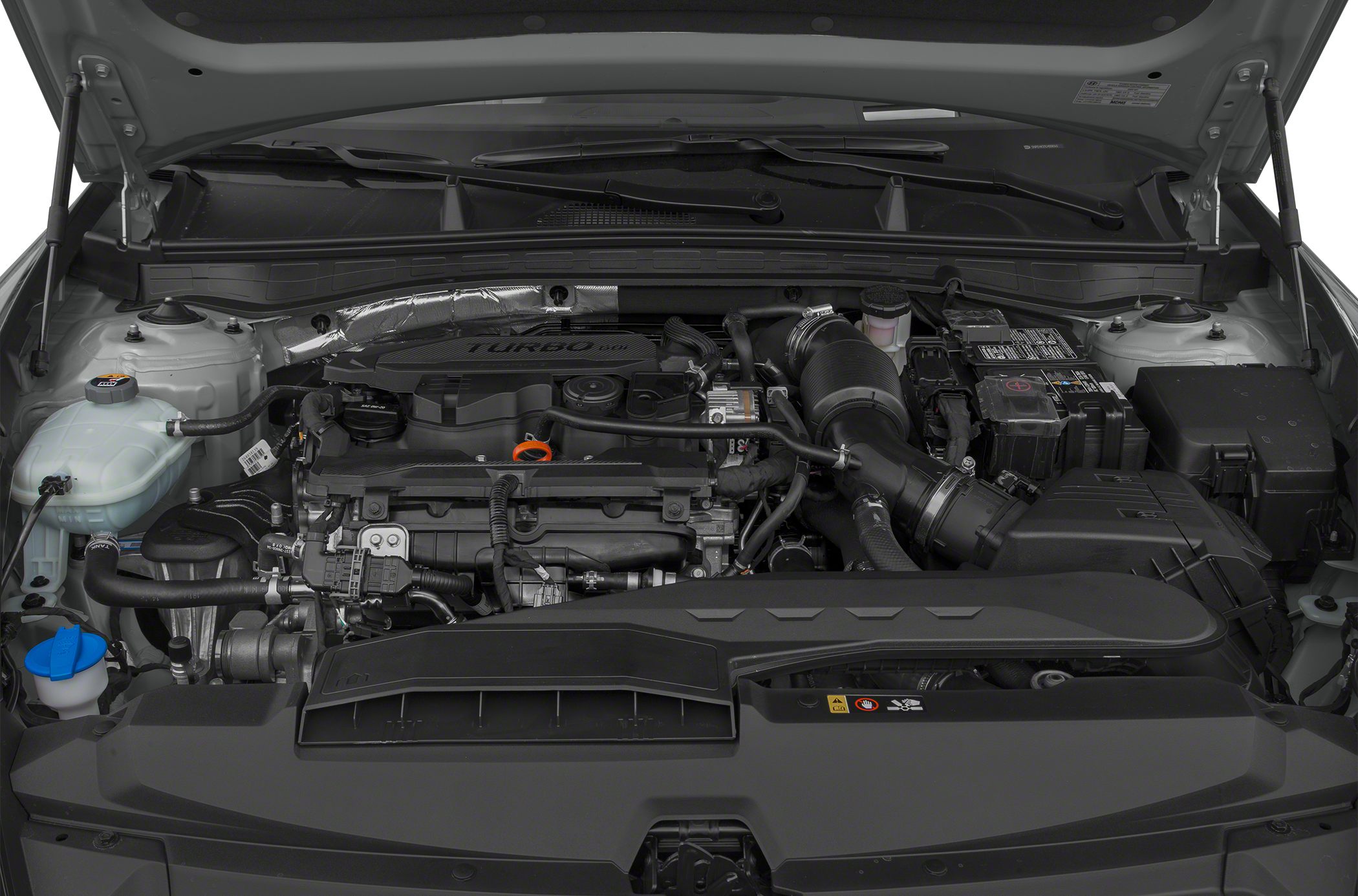 Turbocharged engine bay with visible intake and components