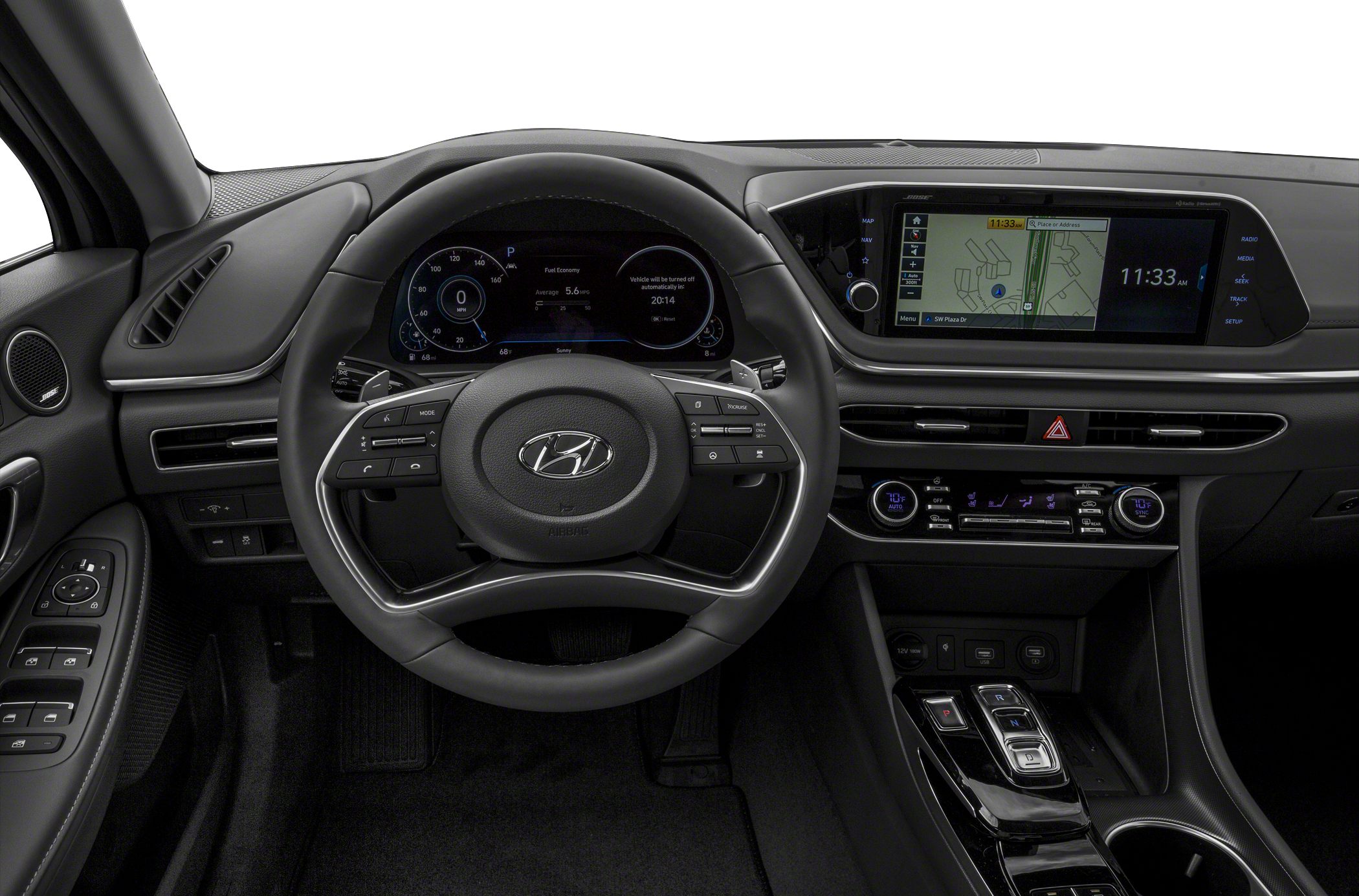 Digital dashboard and infotainment system with steering wheel controls.