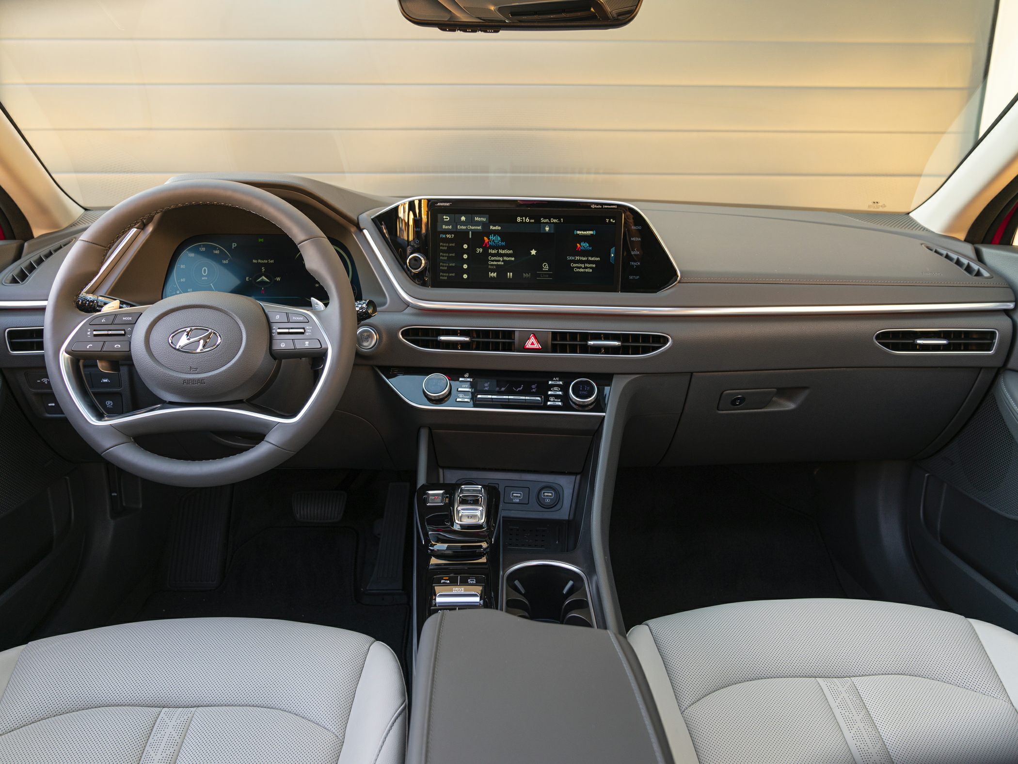 Digital instrument cluster and central touchscreen infotainment display
