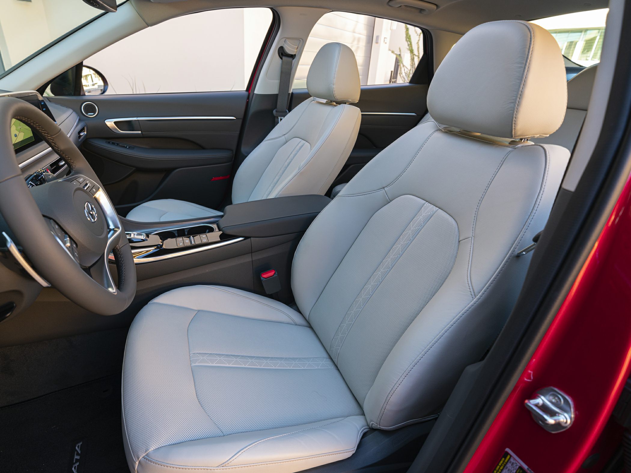 Front seats and dashboard interior with leather upholstery and sleek design