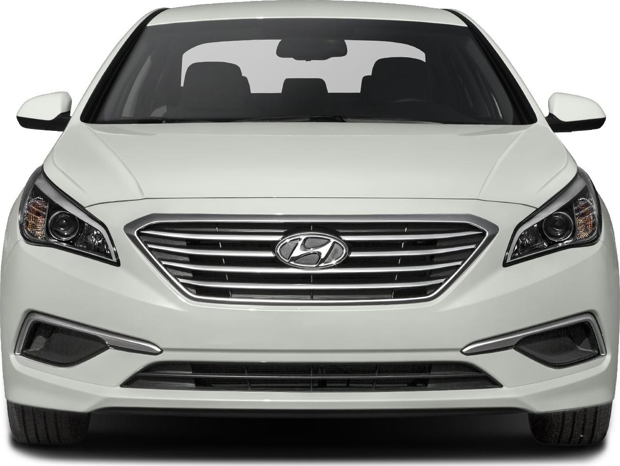 Front view showing grille and headlight design