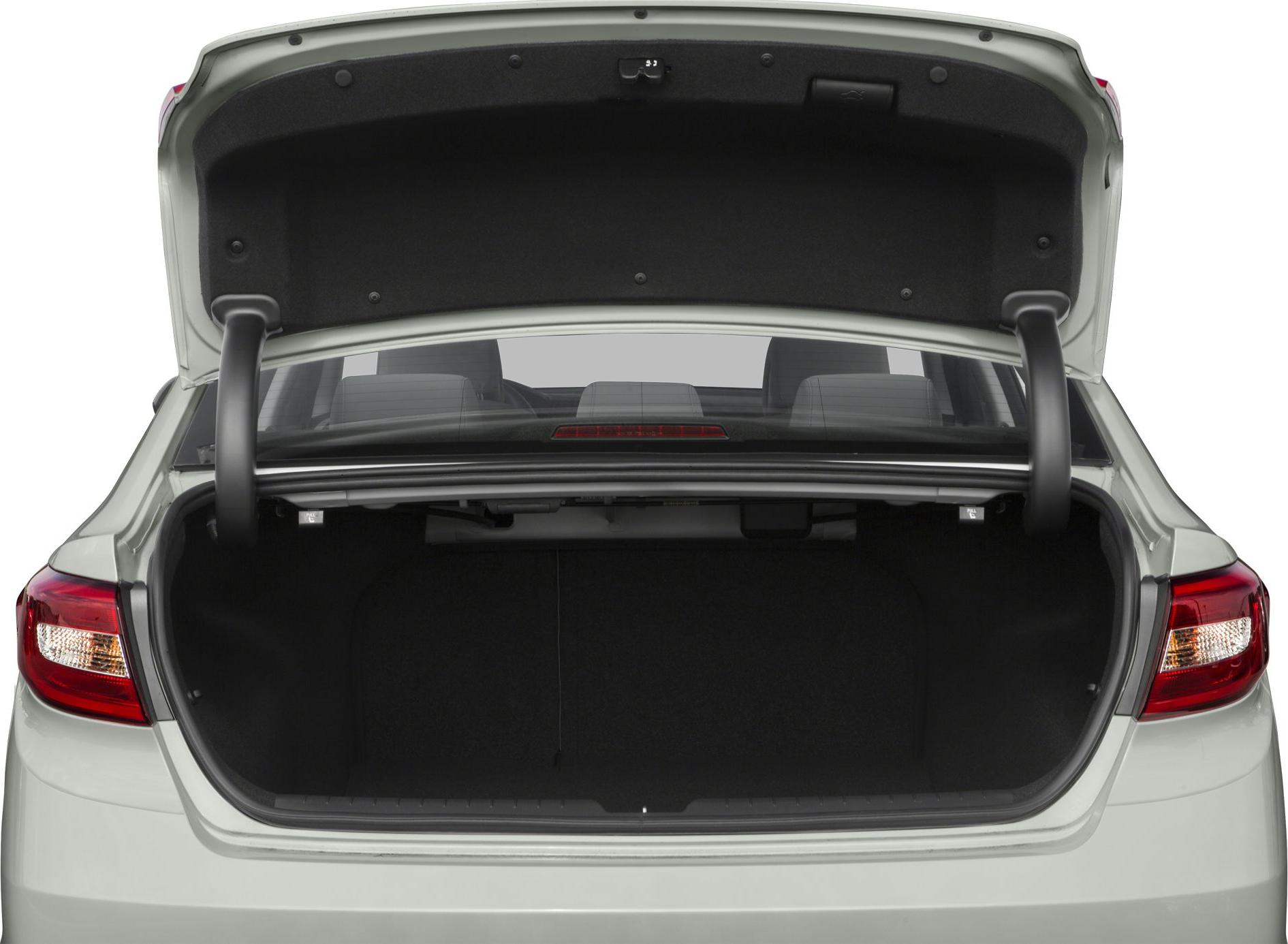 Open sedan trunk with visible rear seats and tail lights