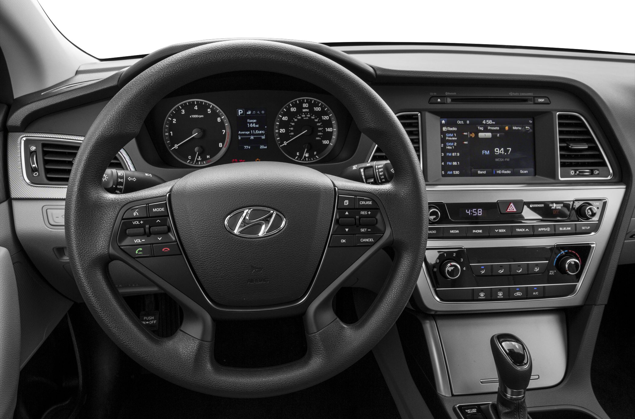 Steering wheel, instrument cluster, and dashboard infotainment system