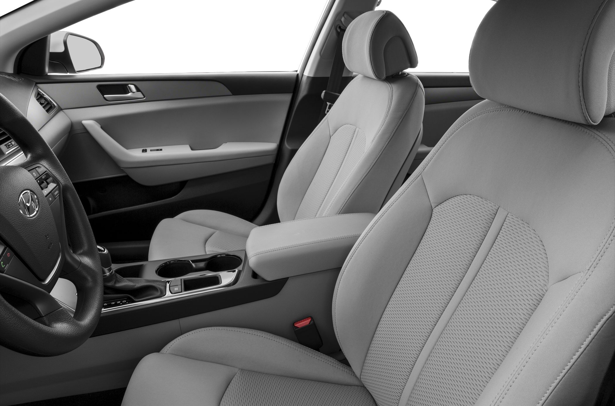 Front seats and center console of a modern car interior