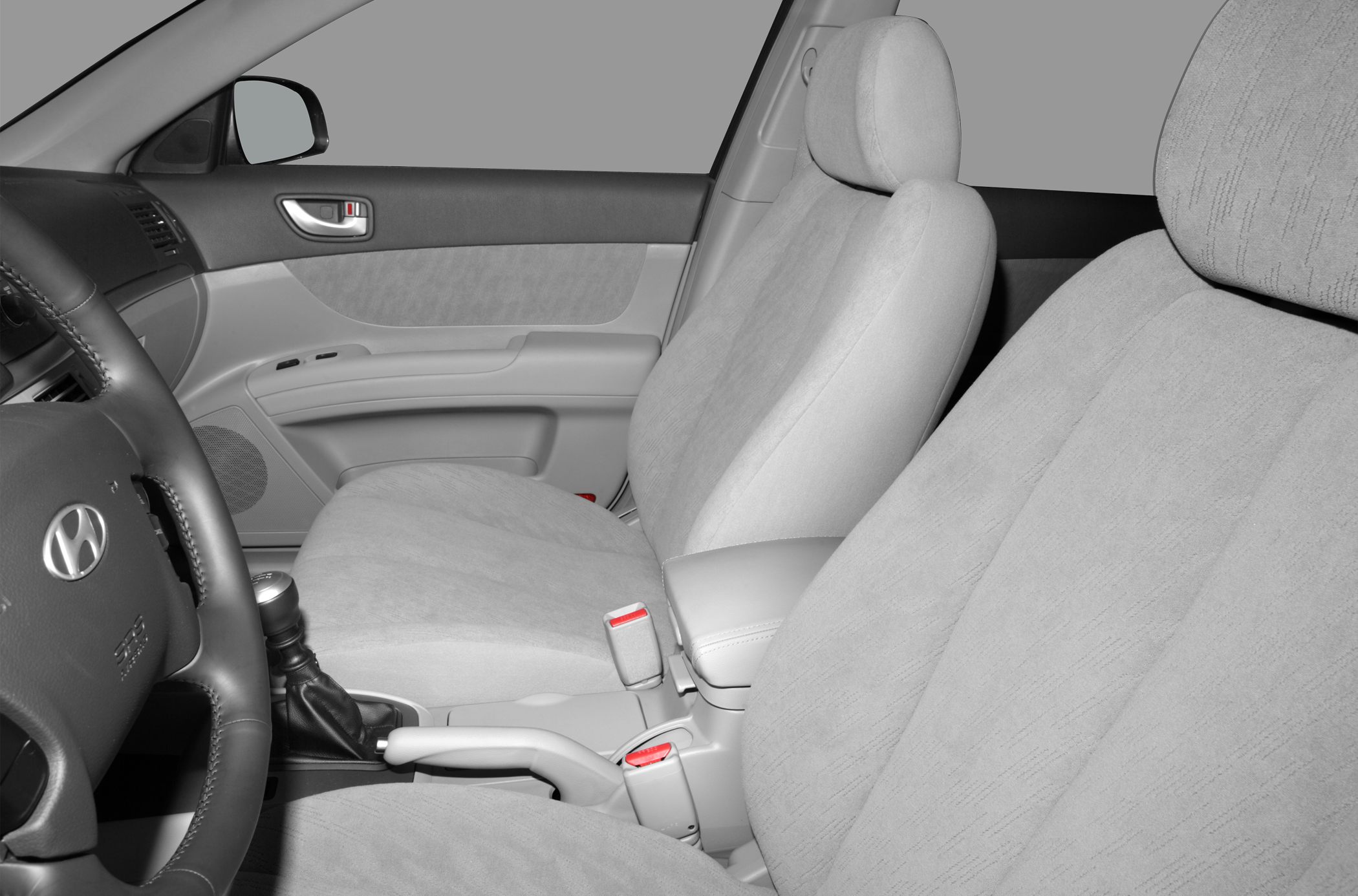 Front seats and center console with manual gear shift