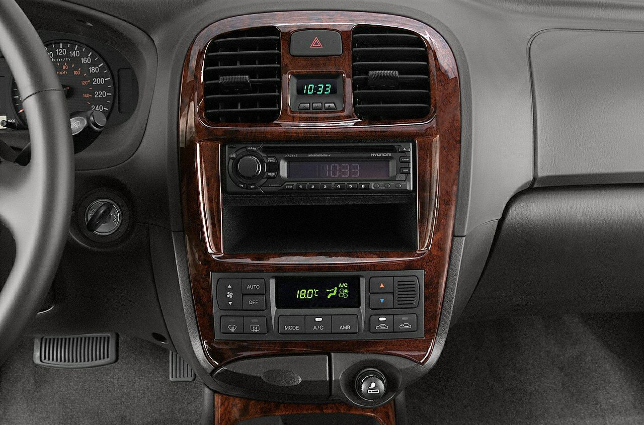 Dashboard center console with radio and digital climate control display
