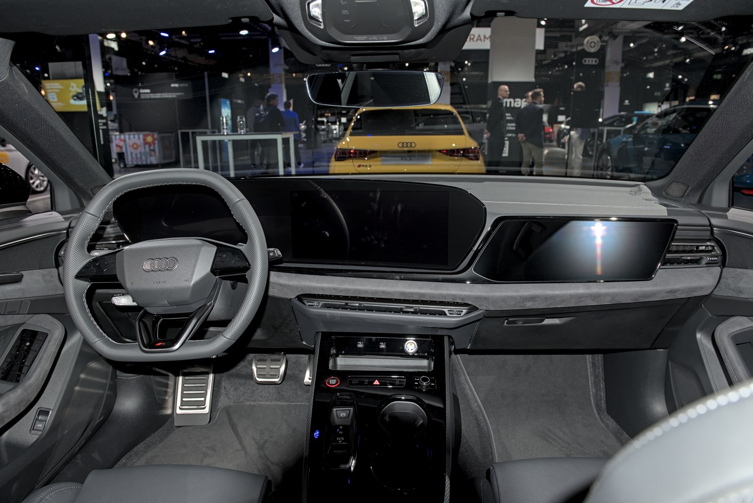 Dashboard with dual digital displays and sporty steering wheel