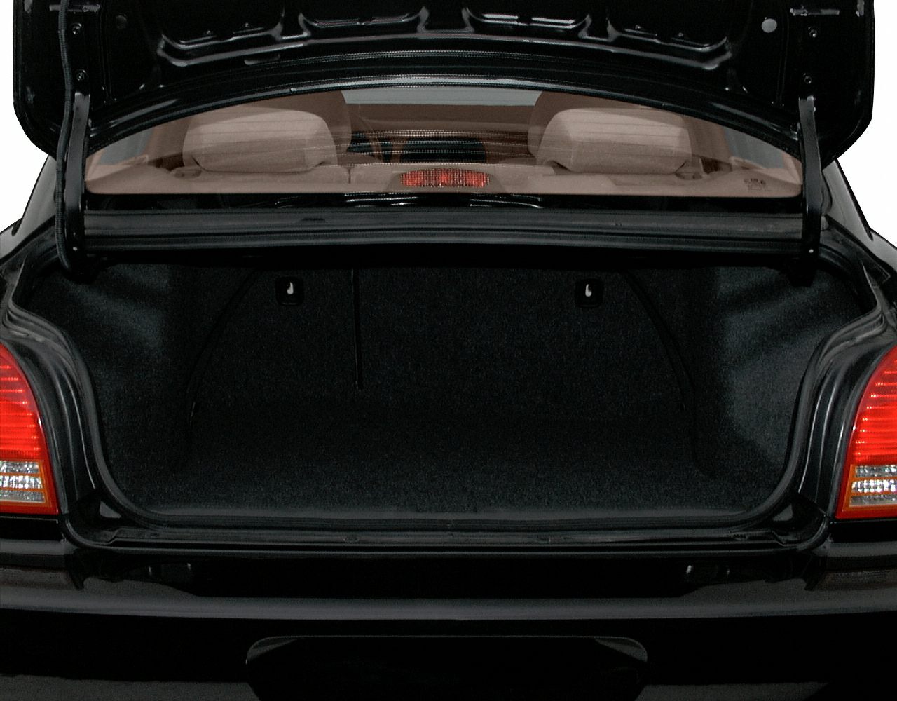 Open spacious sedan trunk with visible rear seatbacks