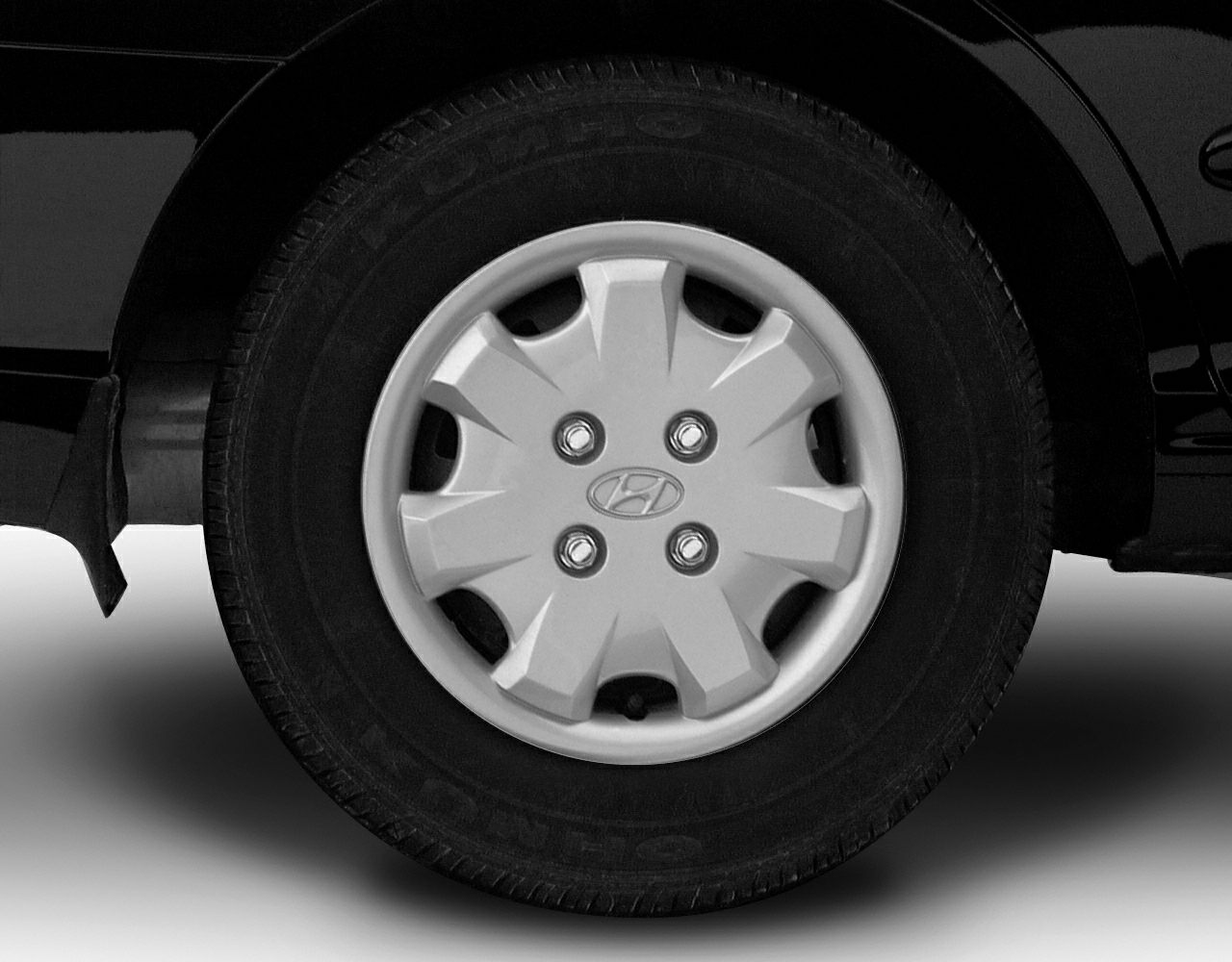 Close-up of a wheel and hubcap with Hyundai logo