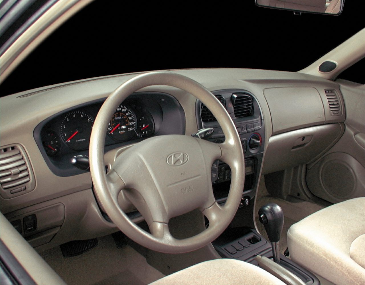 Dashboard and steering wheel with center console and controls