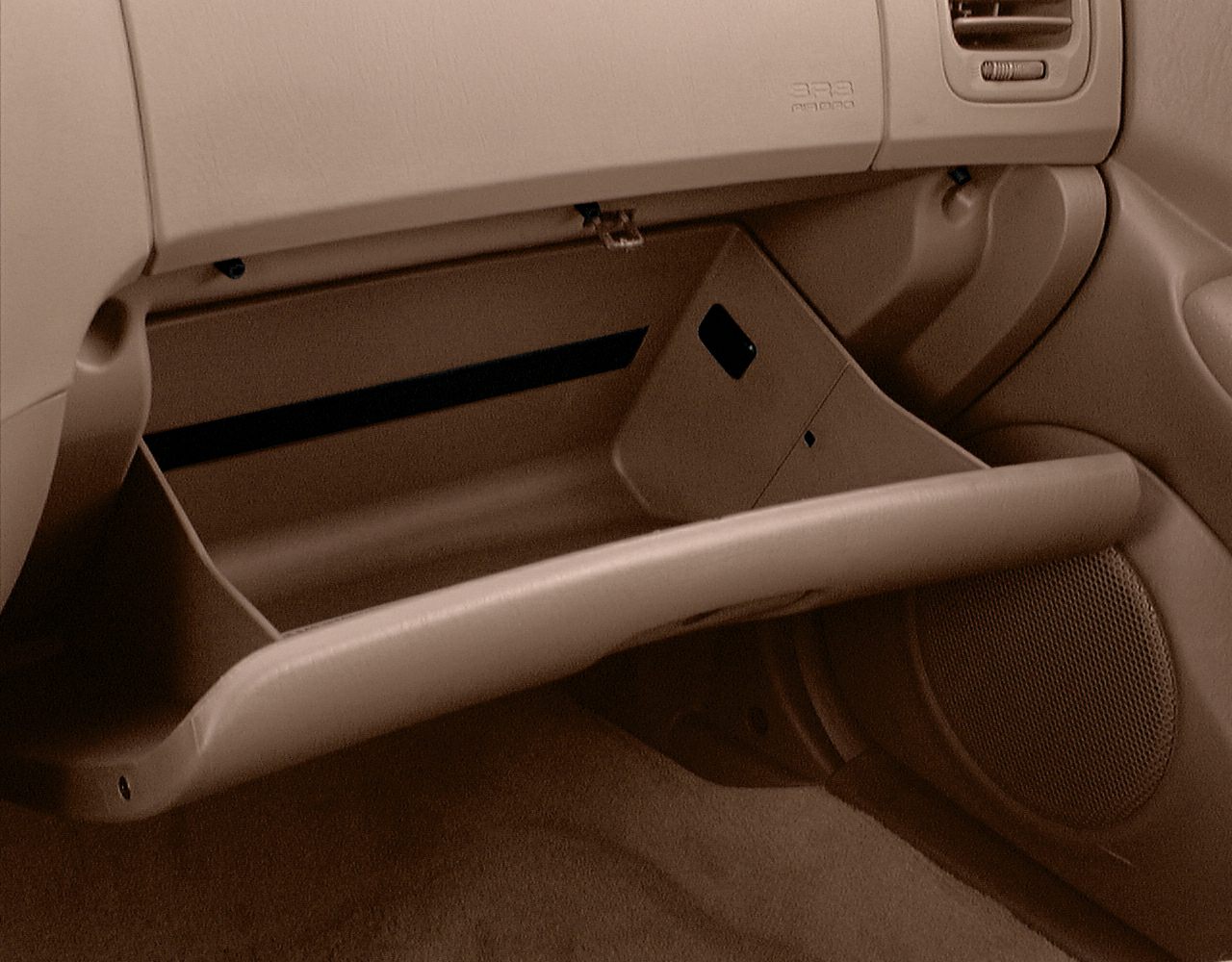 Open glove compartment and passenger side interior details