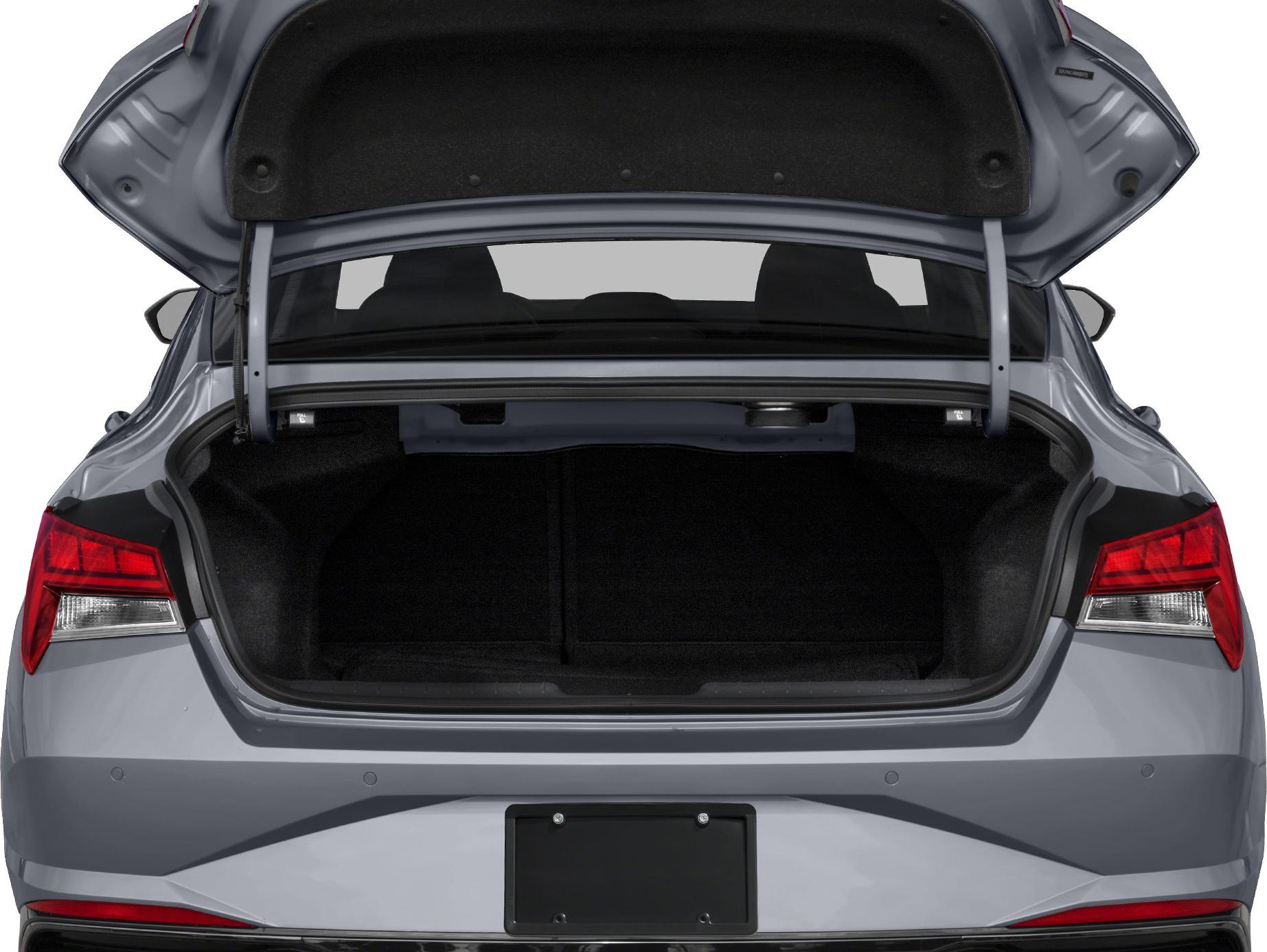 Open spacious trunk with visible rear seats and taillights