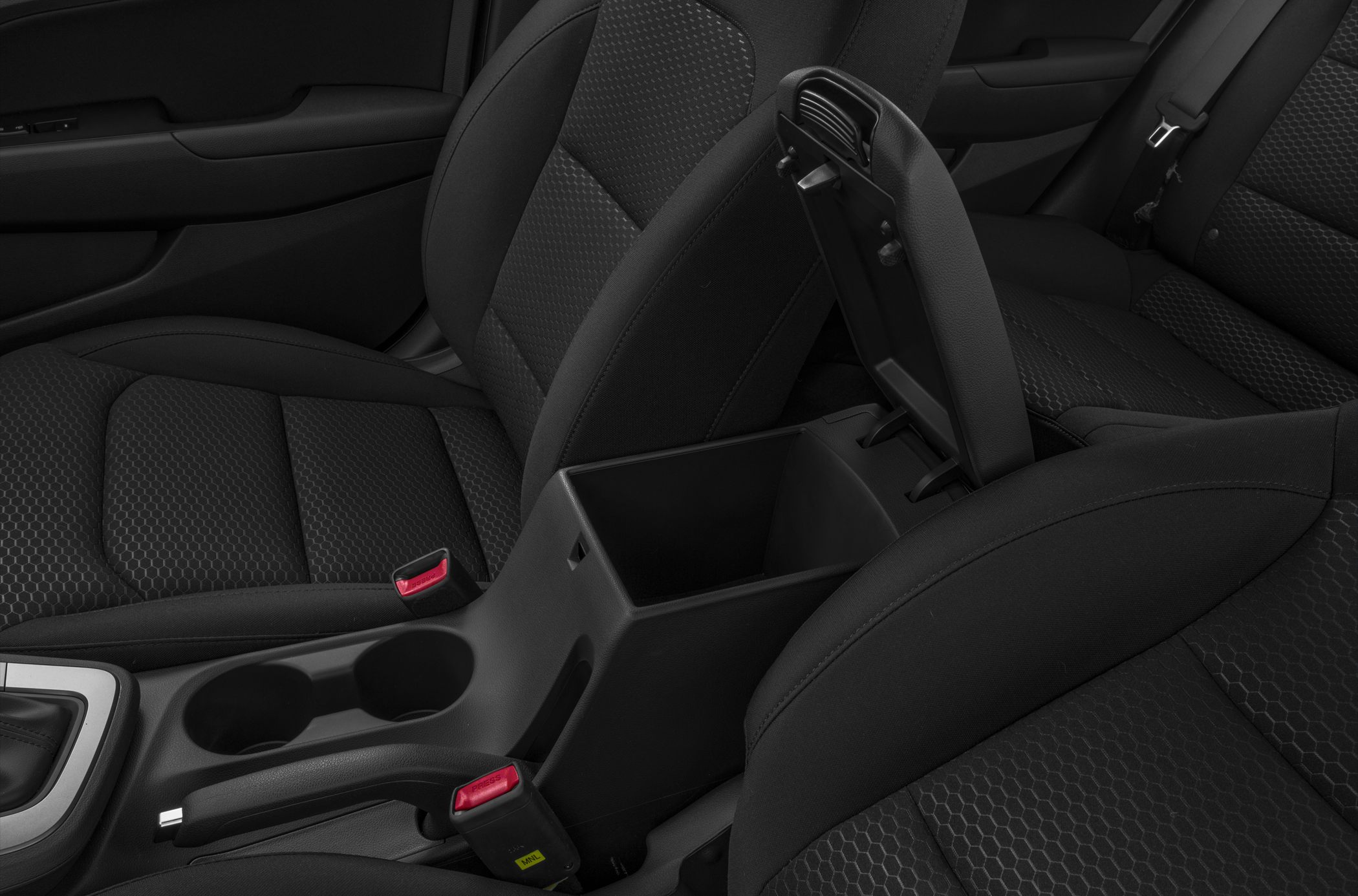 Interior armrest storage compartment and fabric seats in black upholstery
