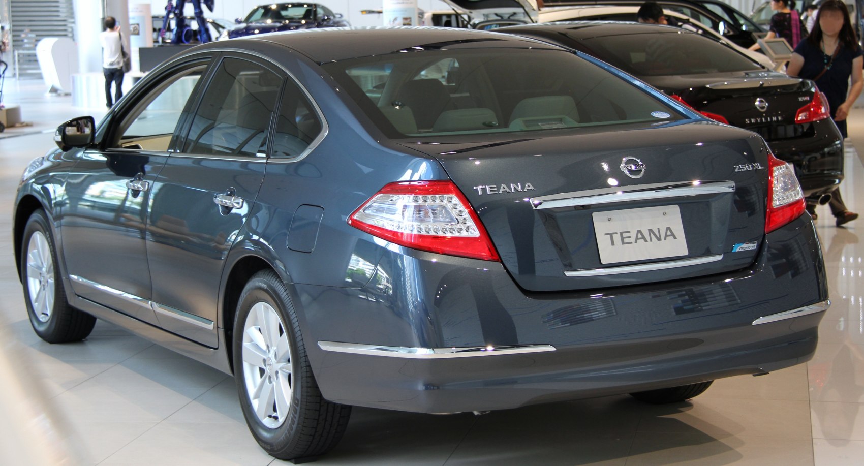 Rear view with distinct tail lights and chrome trim