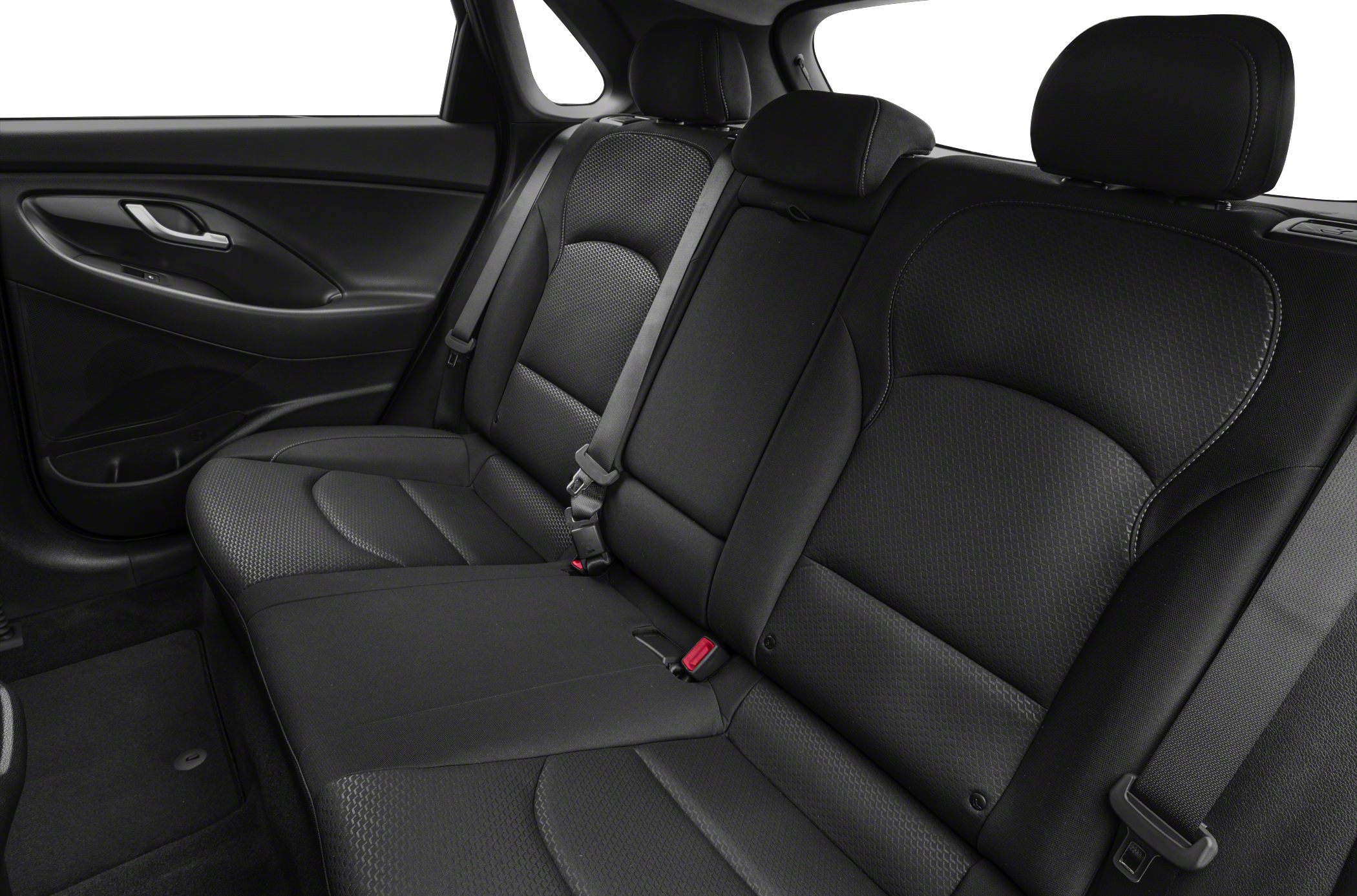 Rear passenger seats with textured upholstery and seat belts