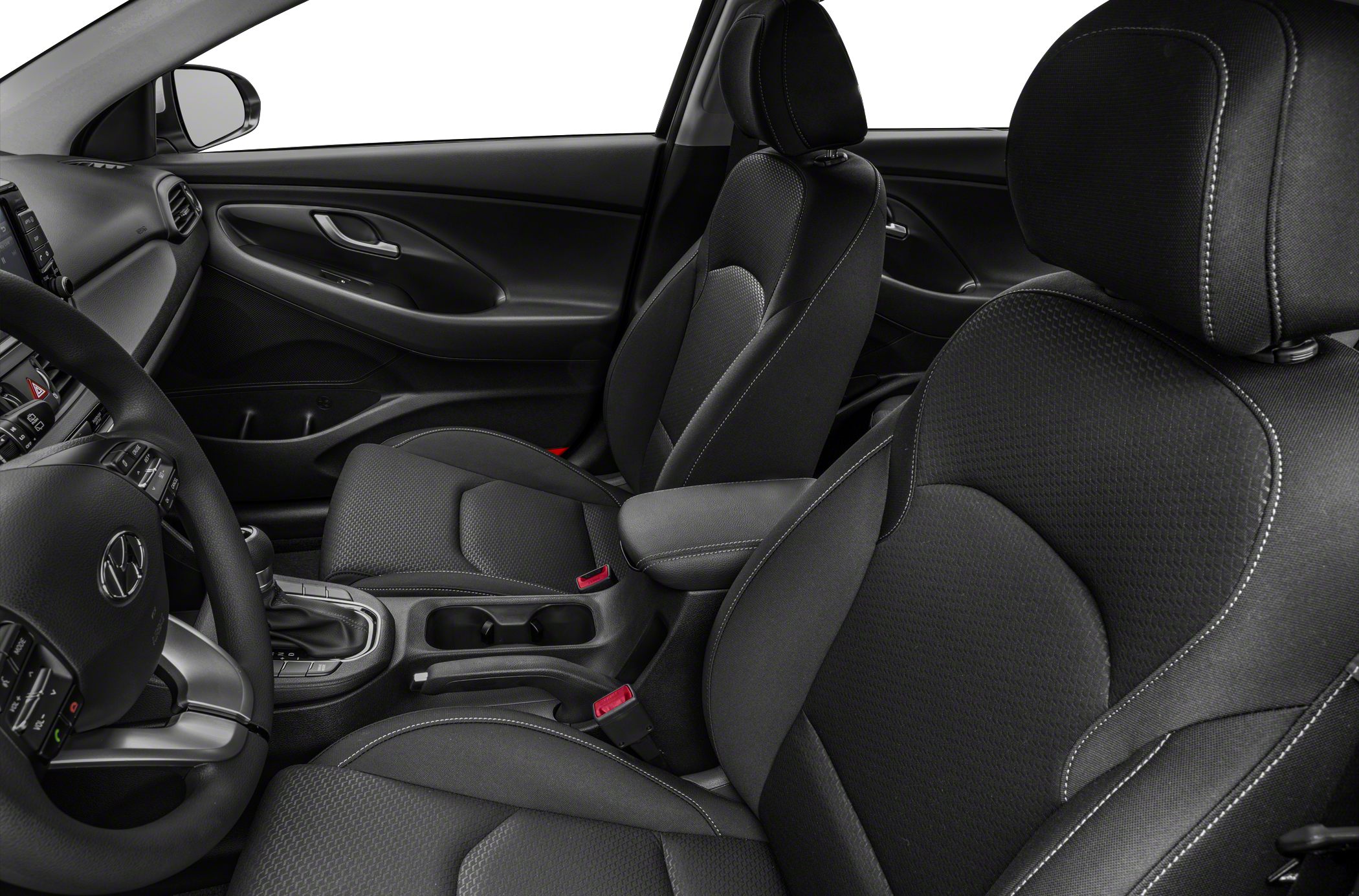 Black fabric car seats with central console and door panel