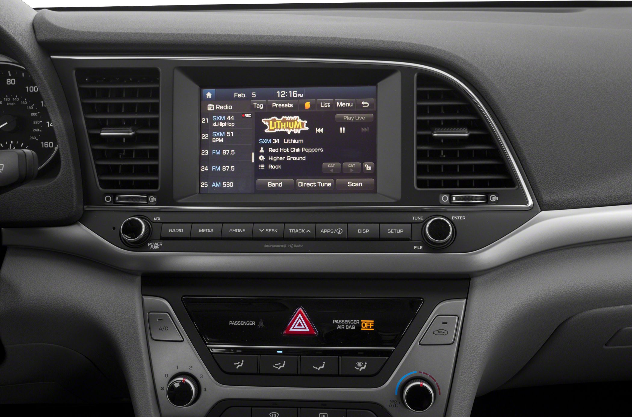 Car infotainment screen and climate control panel with audio and air conditioning buttons