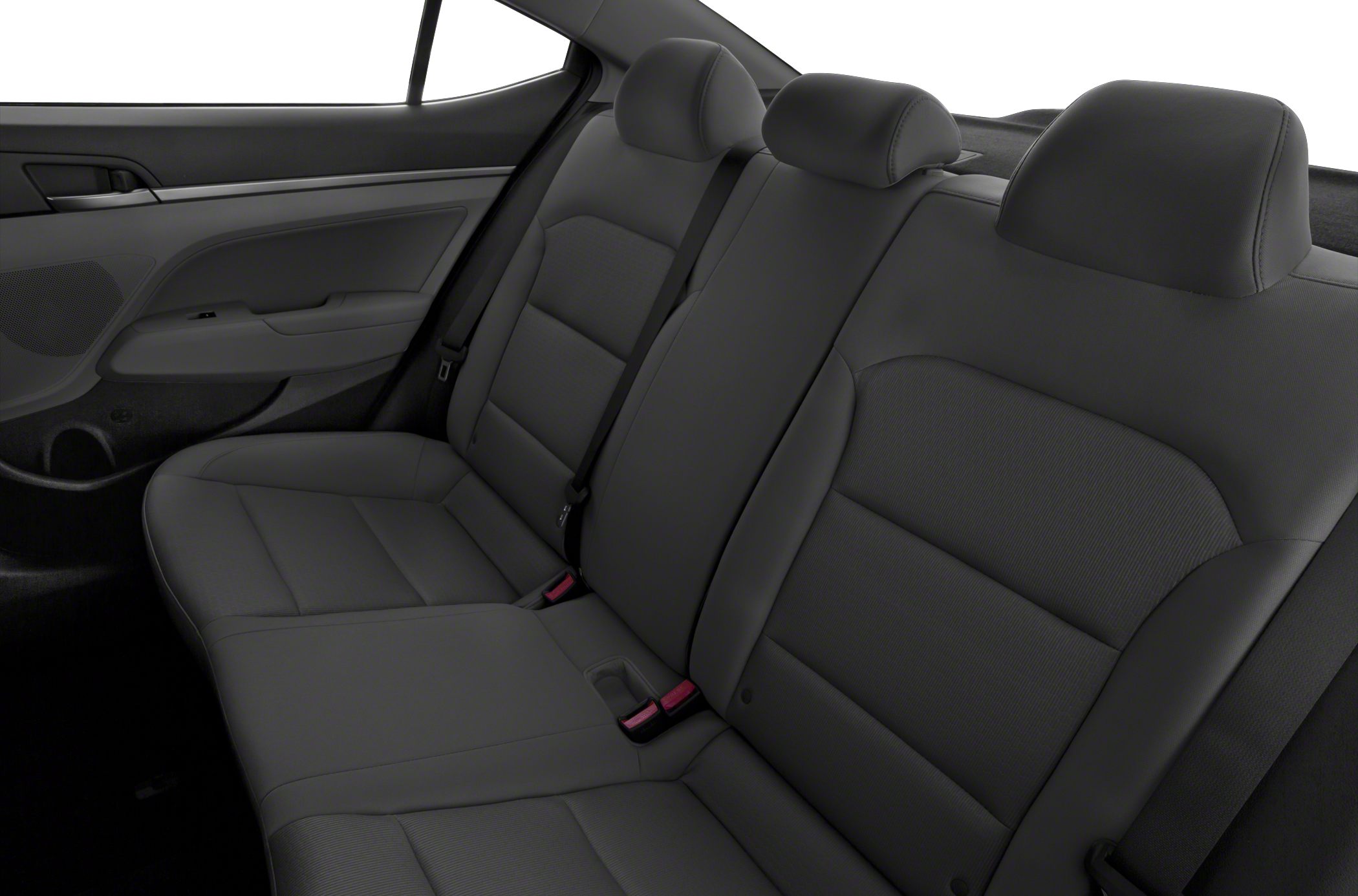 Rear seat interior with black upholstery and headrests