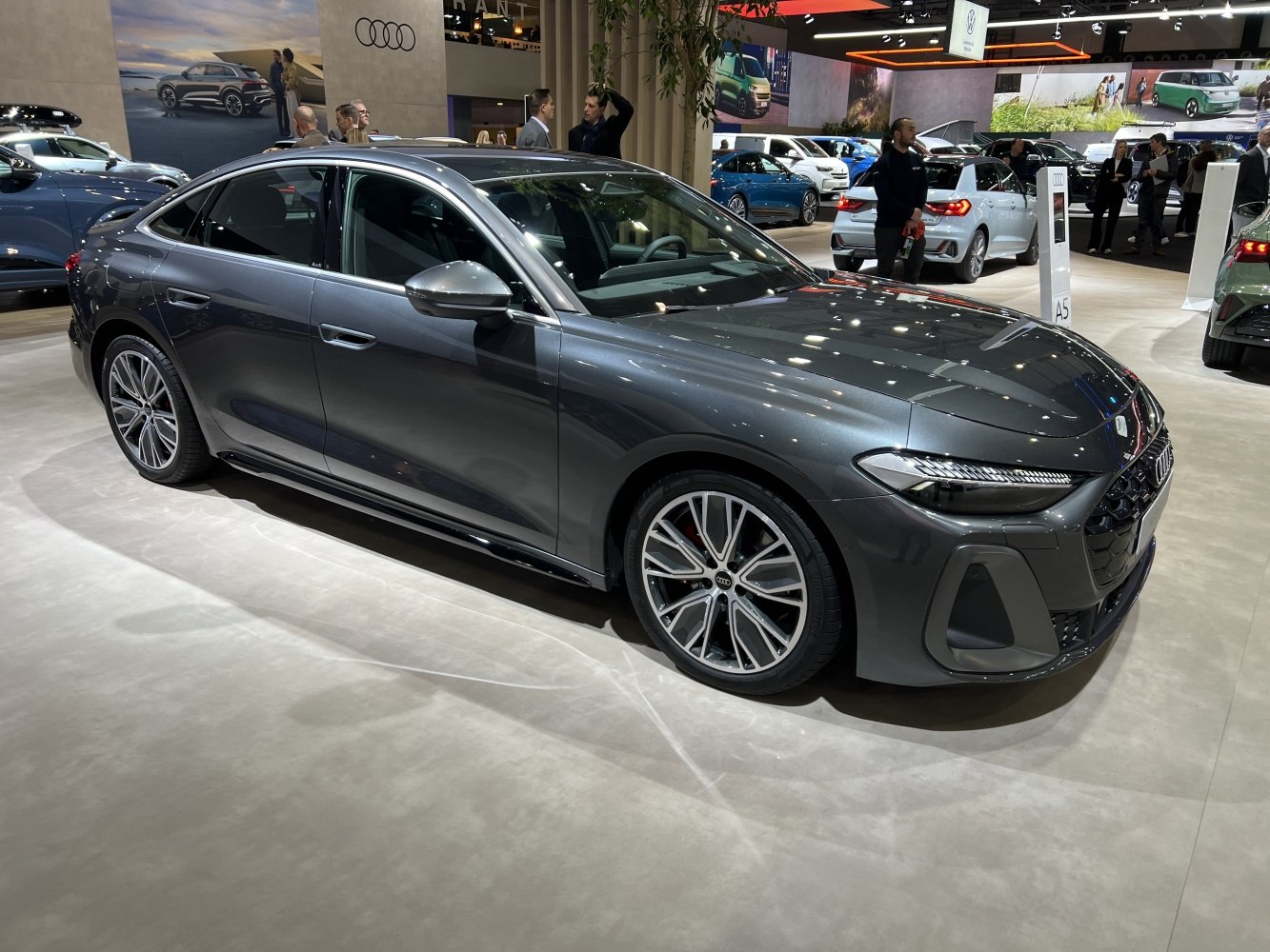 Sleek modern sedan with sharp LED headlights and alloy wheels