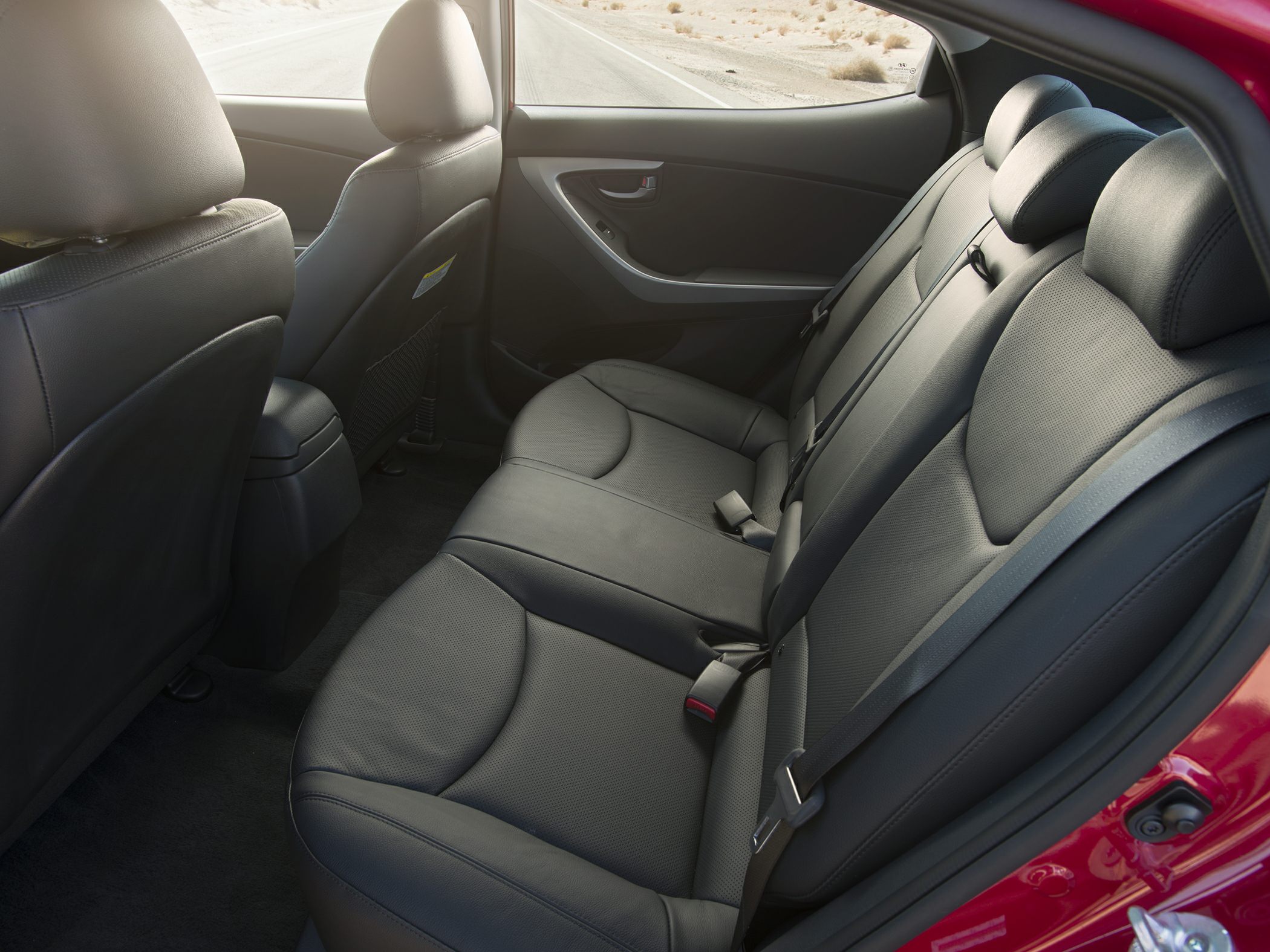 Rear seat leather upholstery and rear cabin interior