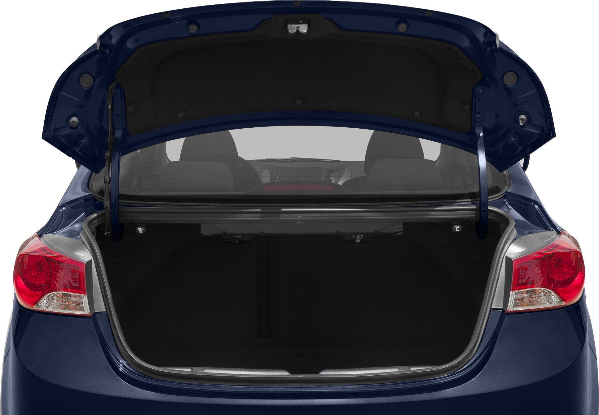 Open trunk with spacious cargo area and visible tail lights