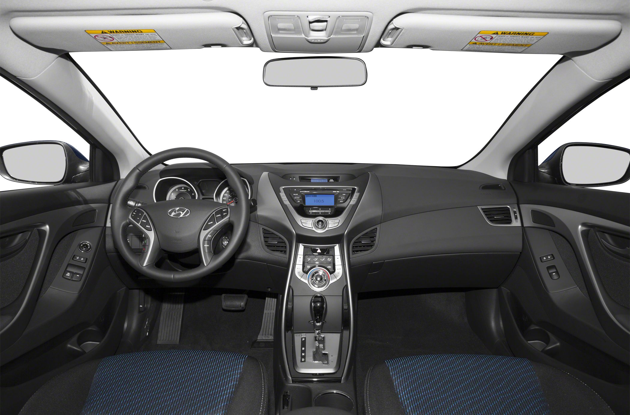 Dashboard, steering wheel, and center console layout in a modern compact coupe
