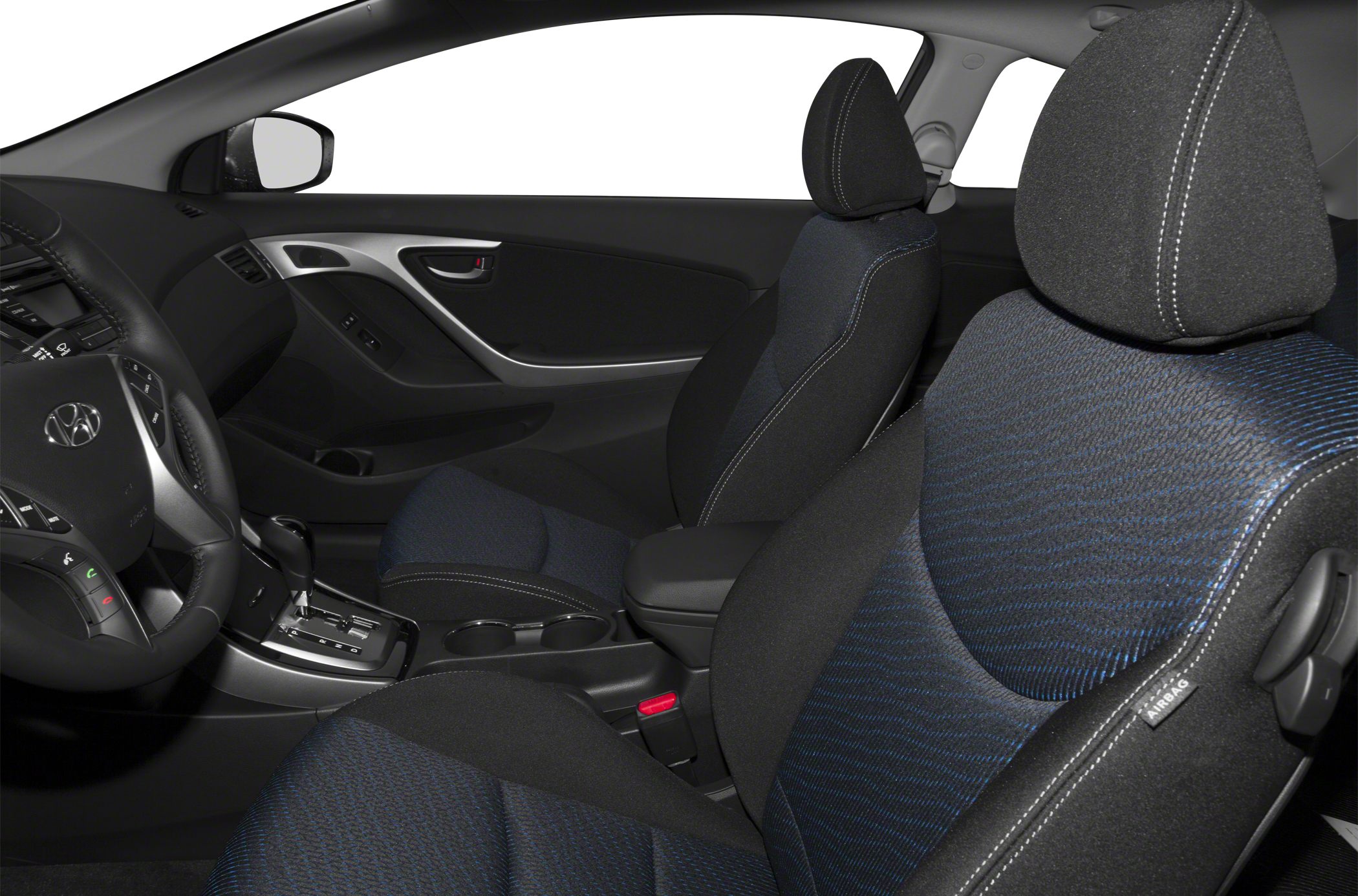 Fabric car seats with blue accents and detailed dashboard interior