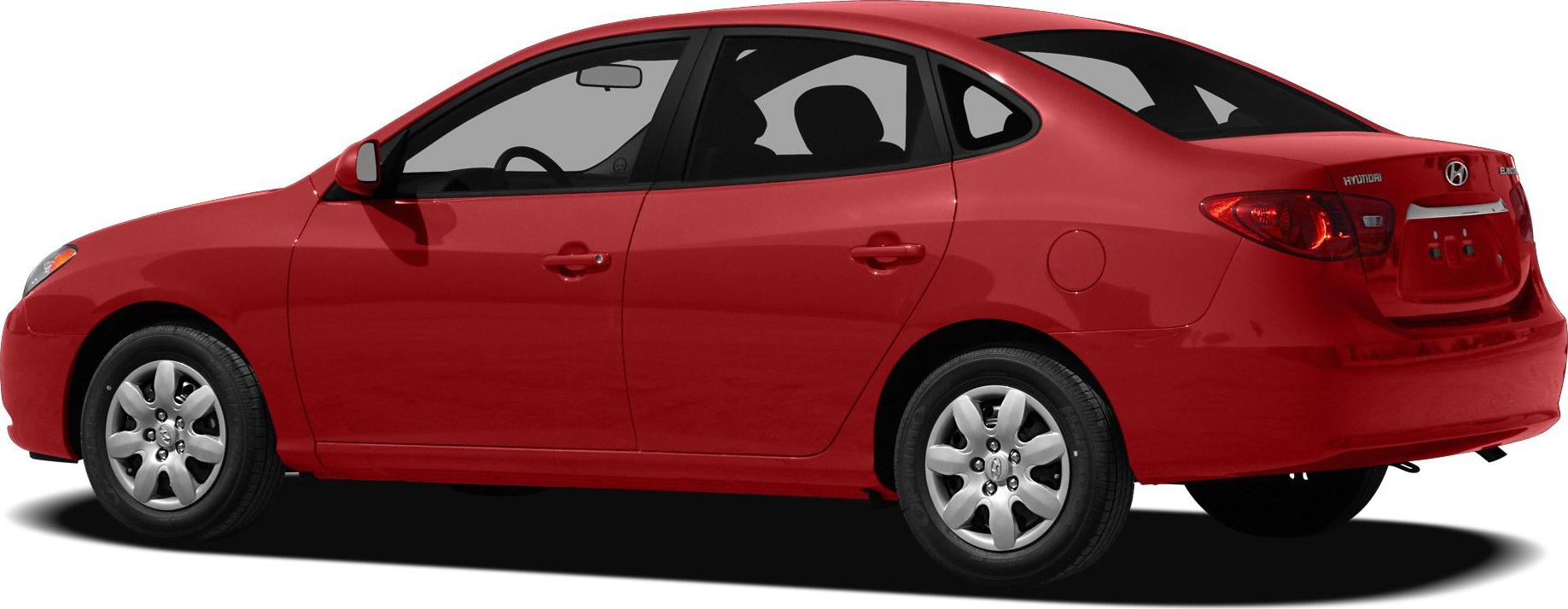 Red compact sedan side view with rounded tail lights and alloy wheels