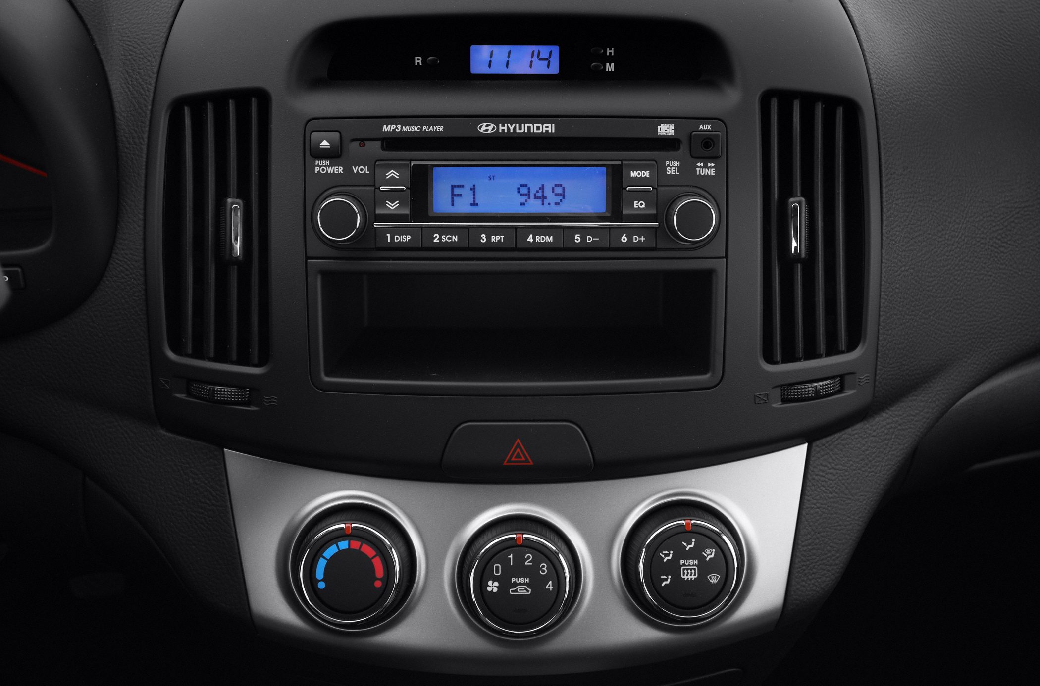 Center console with radio and climate control dials