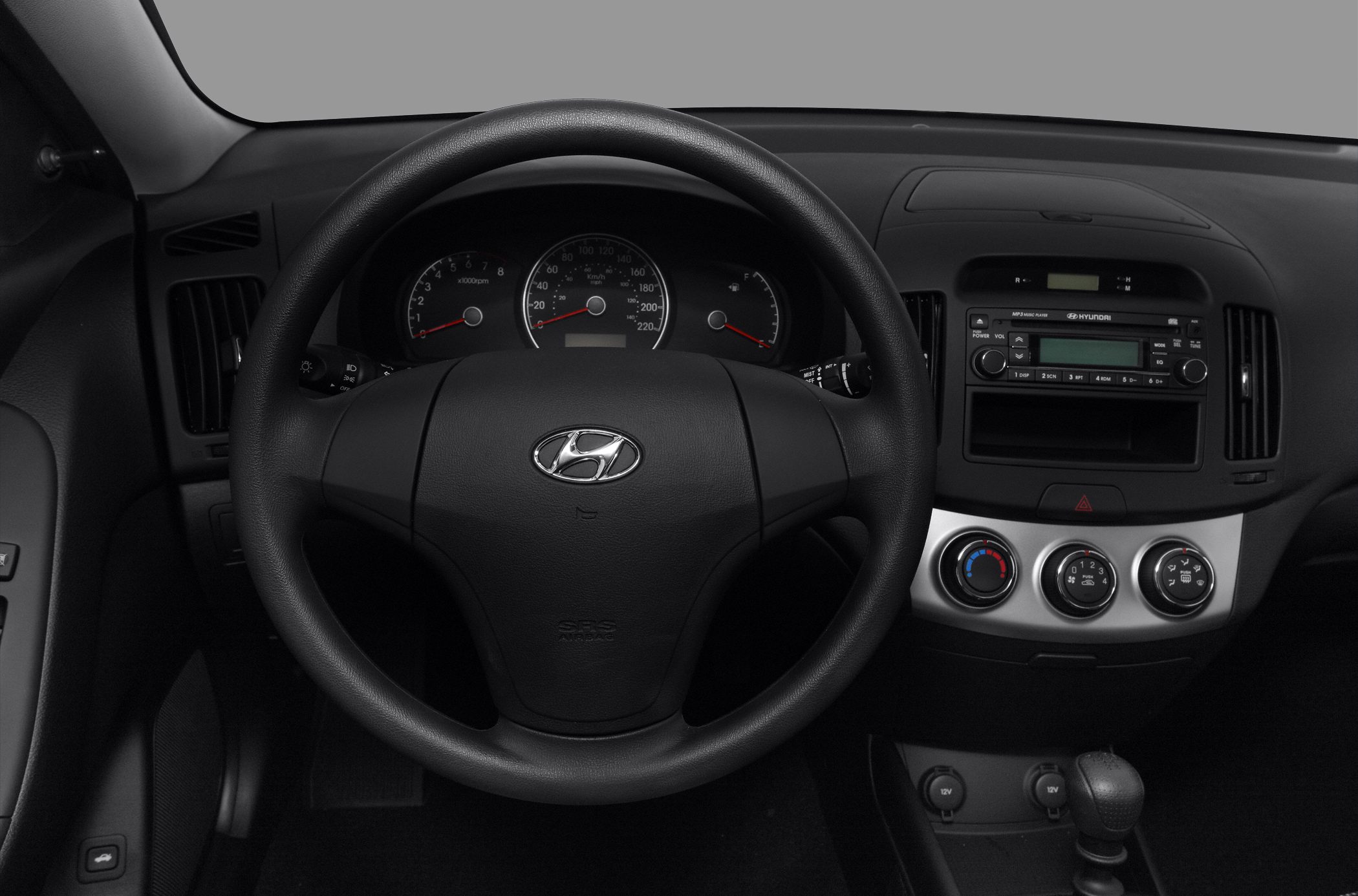 Steering wheel with instrument cluster and center console dials
