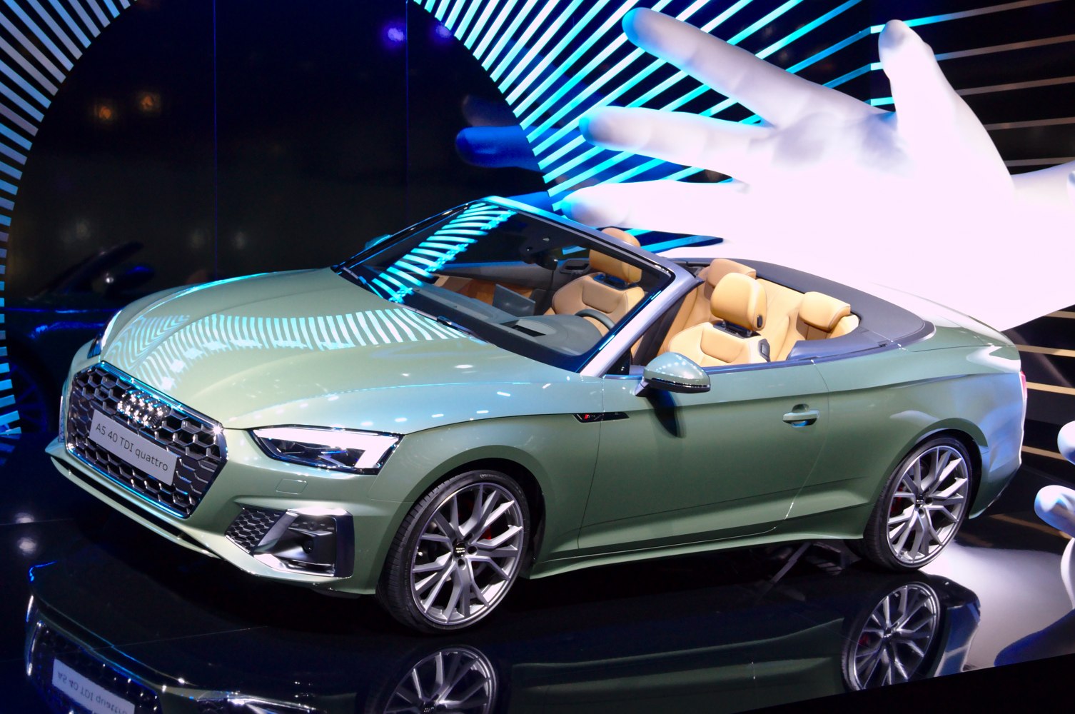 Convertible with sleek open-top design and sporty alloy wheels