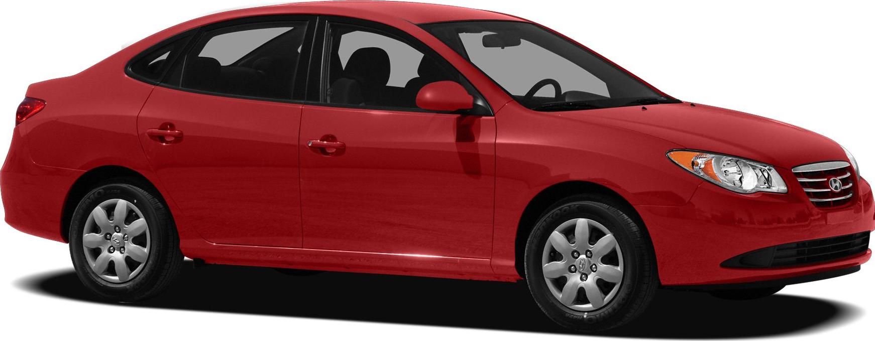 Side profile of red four-door sedan with alloy wheels