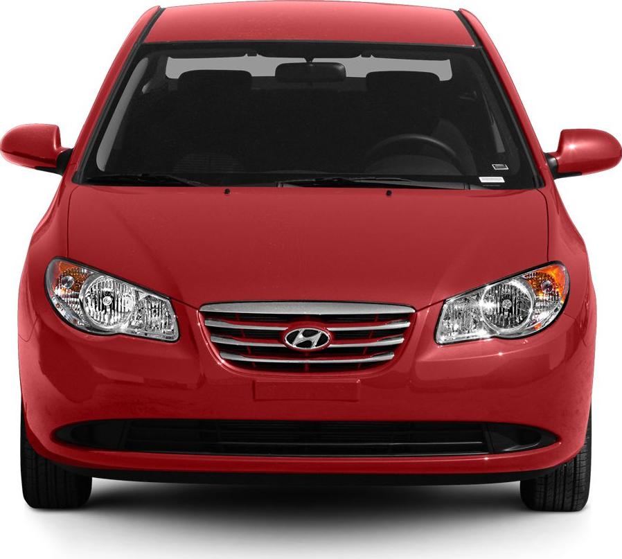 Front view with headlights and grille of a red sedan