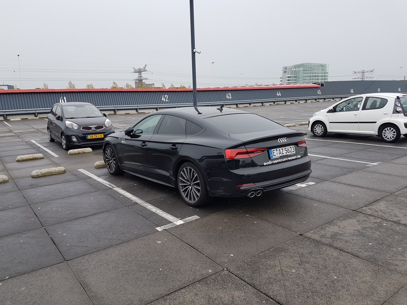 Rear side view with taillights and dual exhaust
