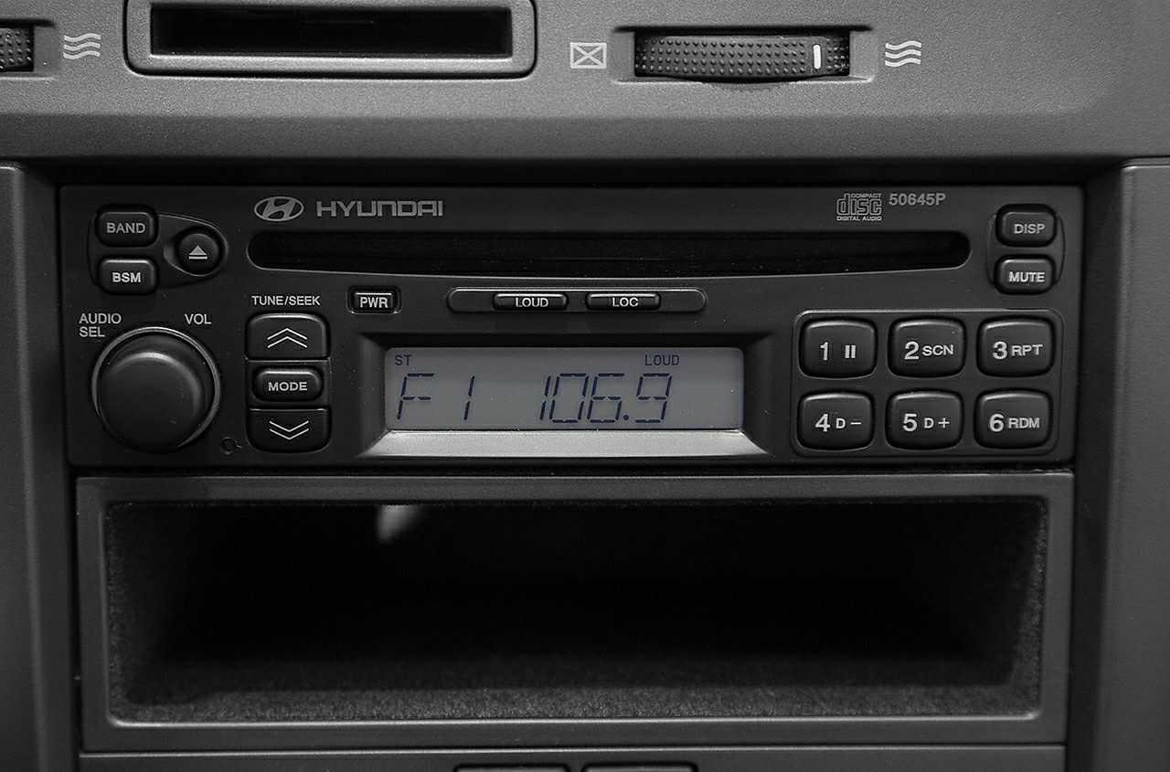 Close-up of 2001 Hyundai Elantra III car radio stereo panel