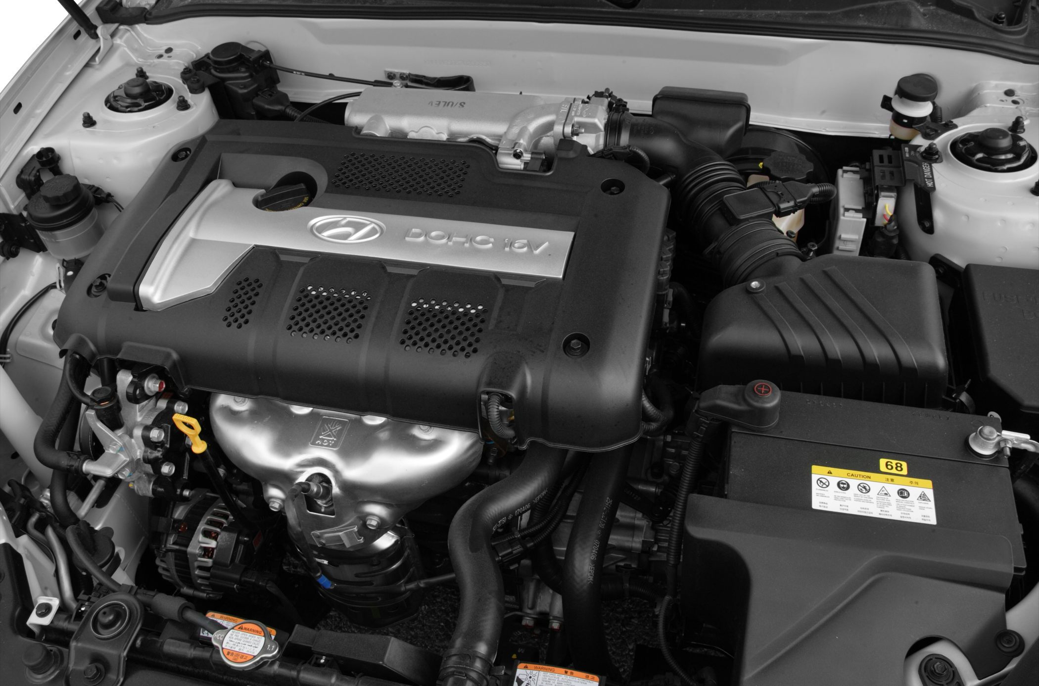 Hyundai Tiburon II 2002 engine bay with DOHC 16V engine cover