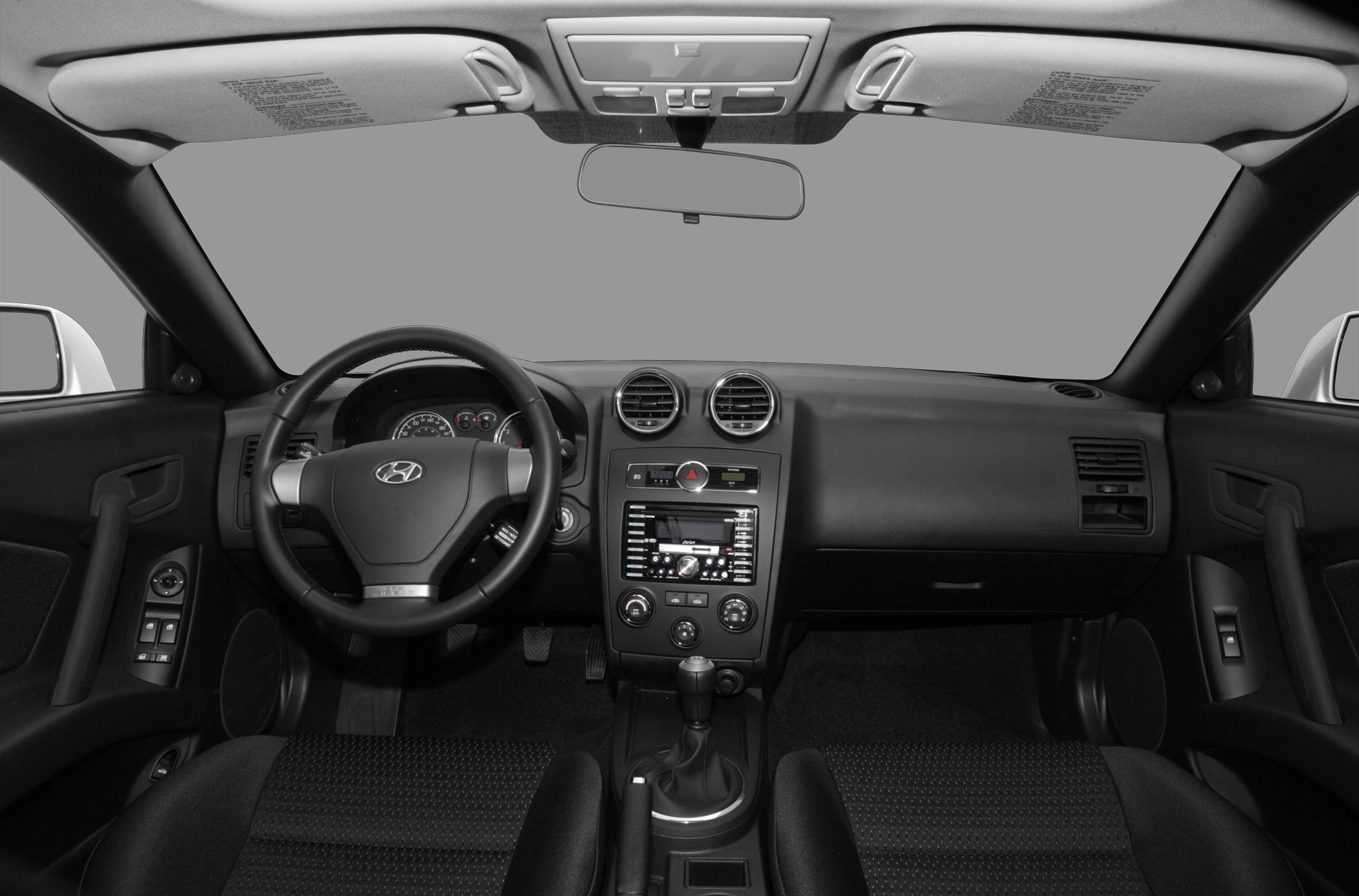 Steering wheel and dashboard with center console
