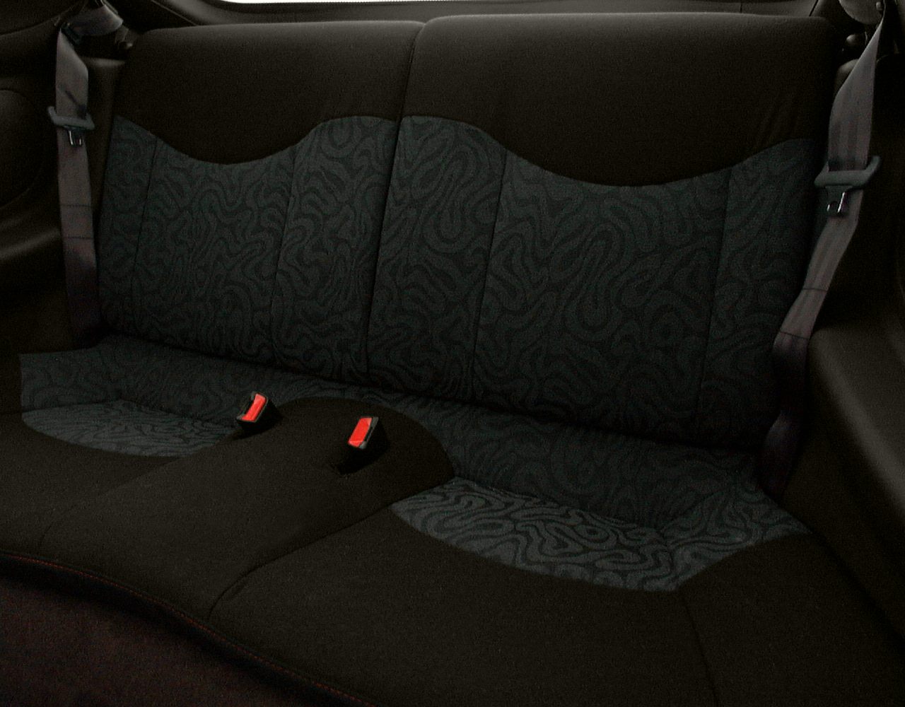 Rear seat with patterned fabric upholstery and seat belts