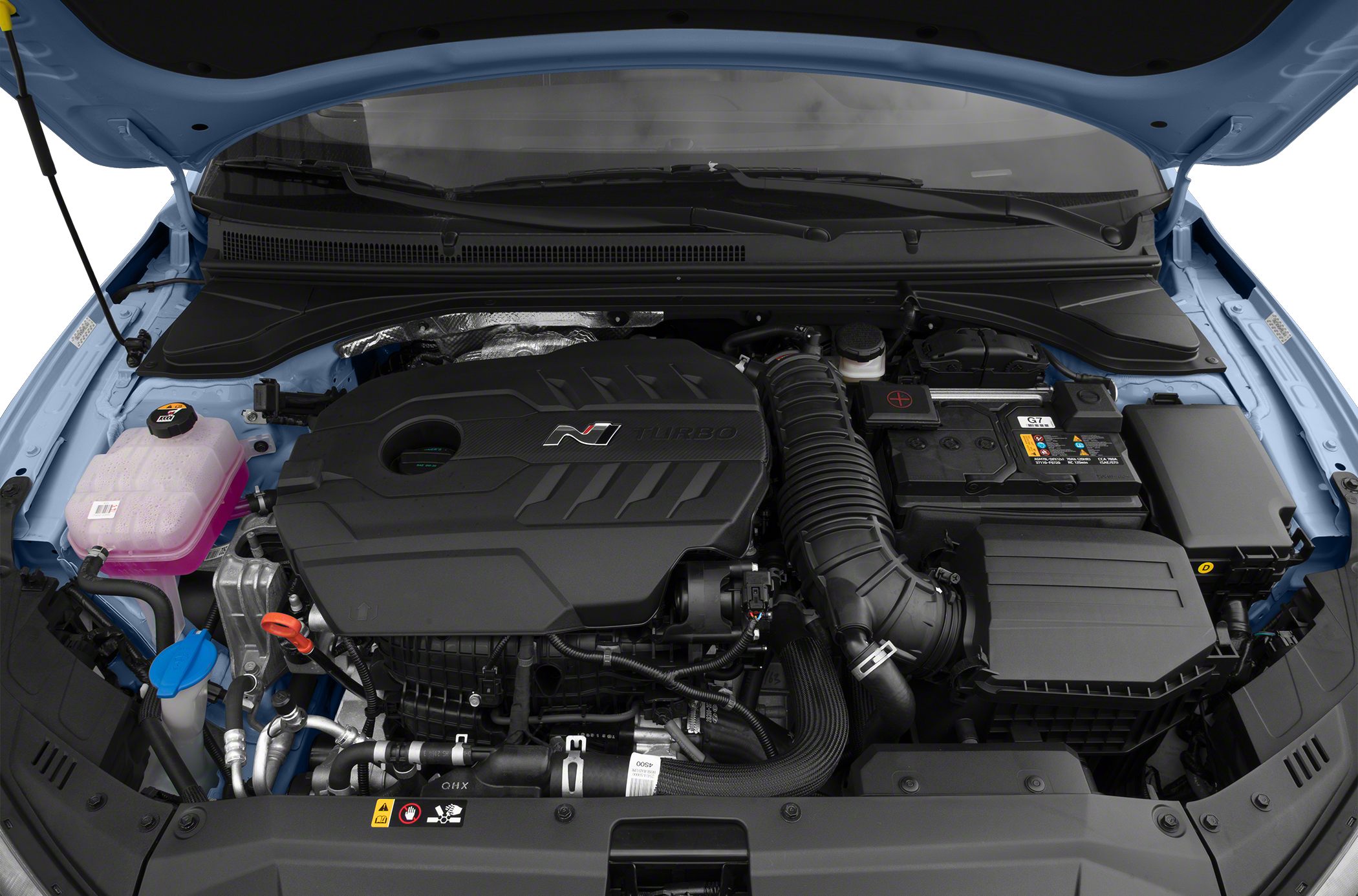 Turbocharged engine bay with covered engine and intake system