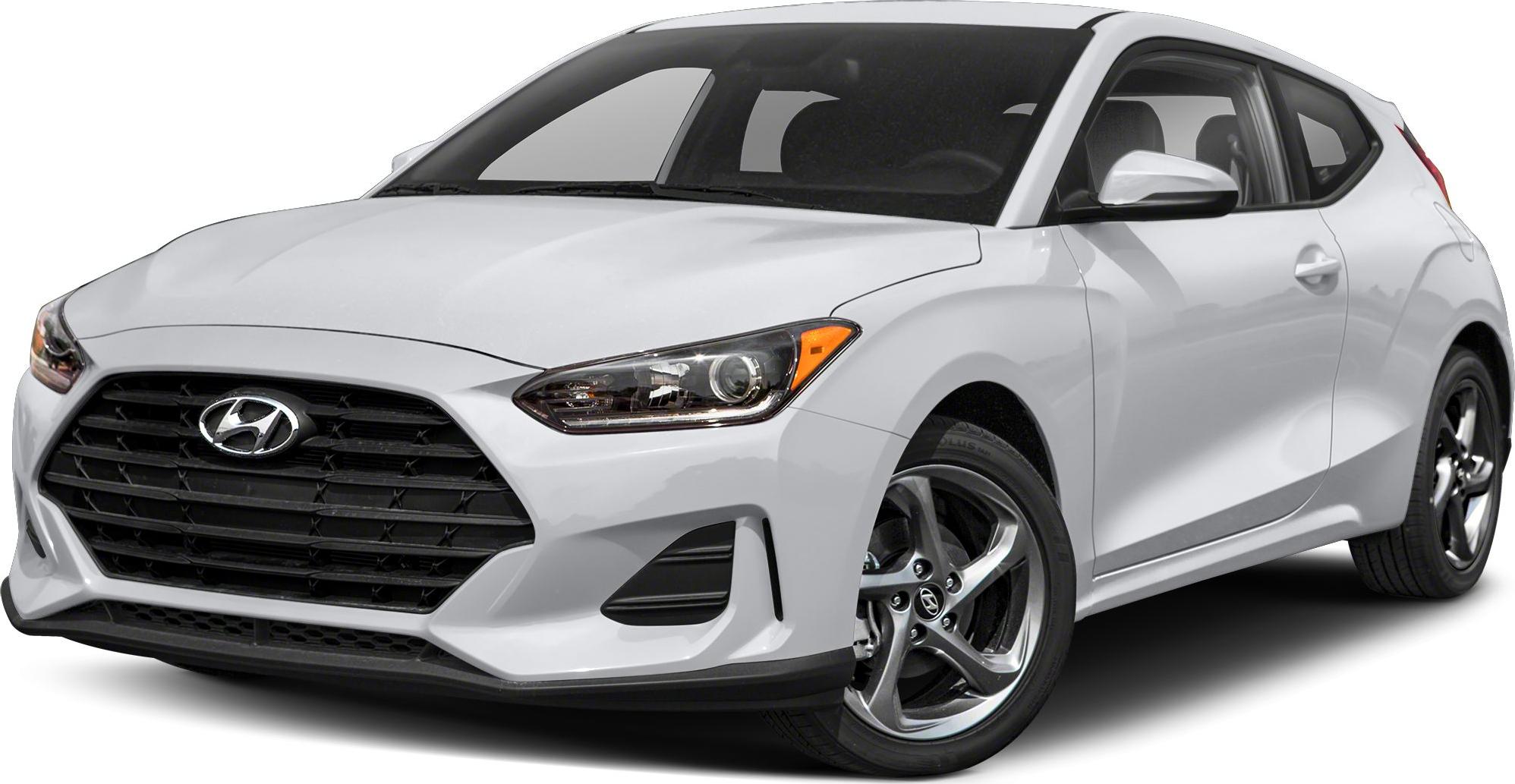 Front side view showing hexagonal grille and sharp headlights