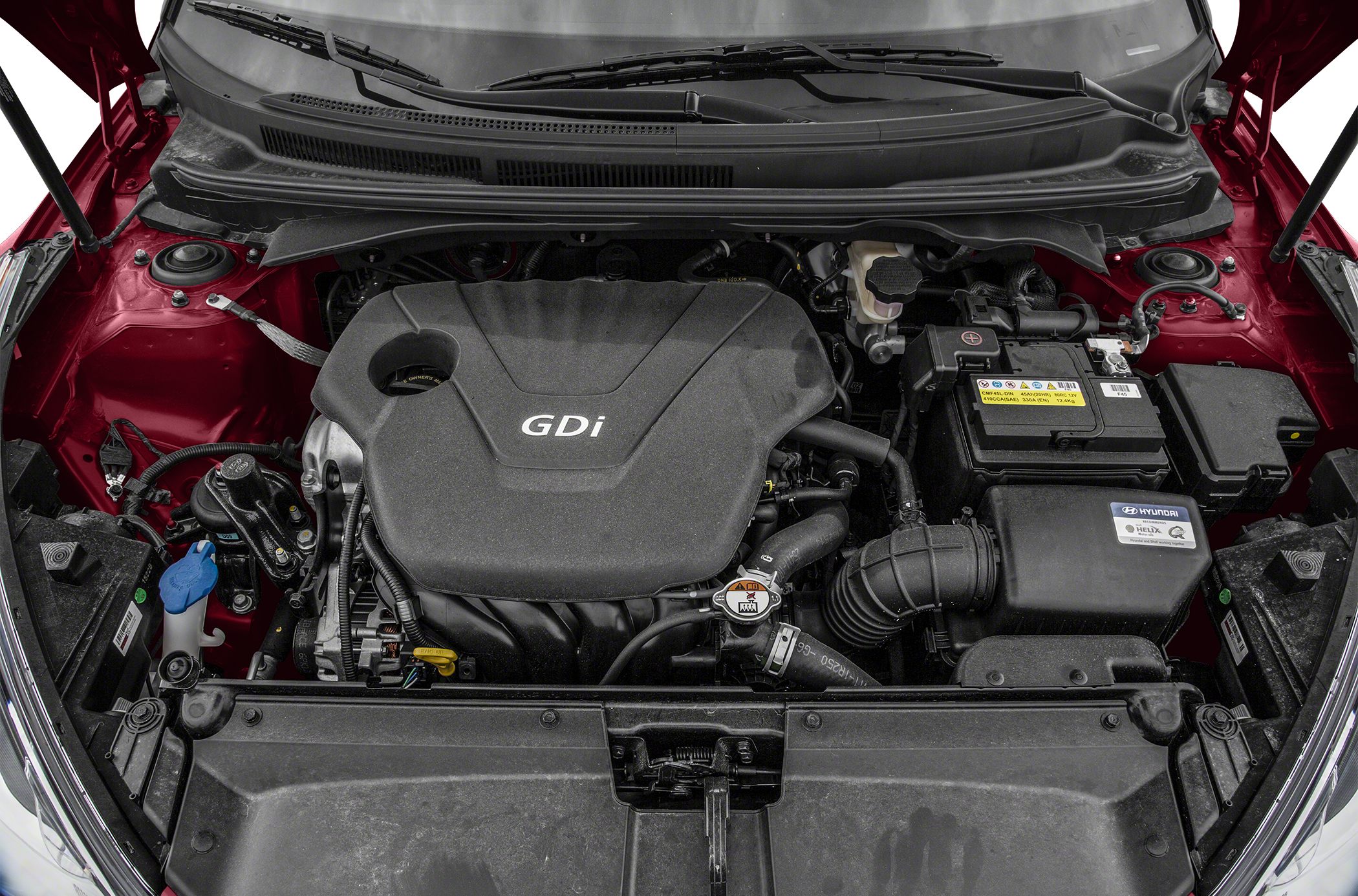 GDi engine compartment with battery and fluid reservoirs