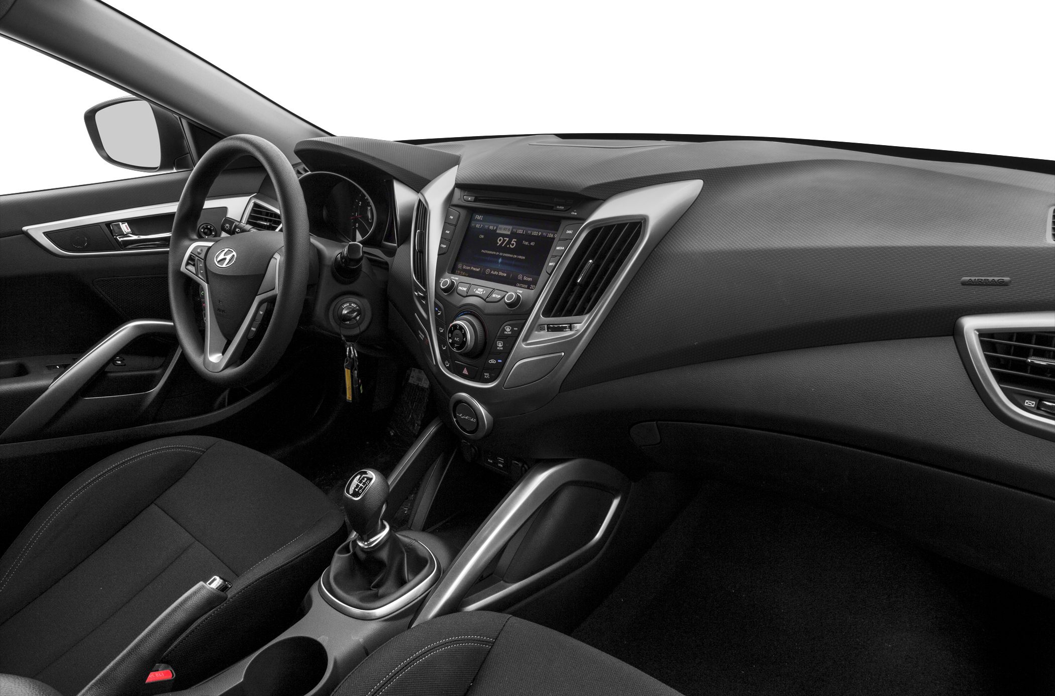 Dashboard, infotainment center, manual gearshift, steering wheel